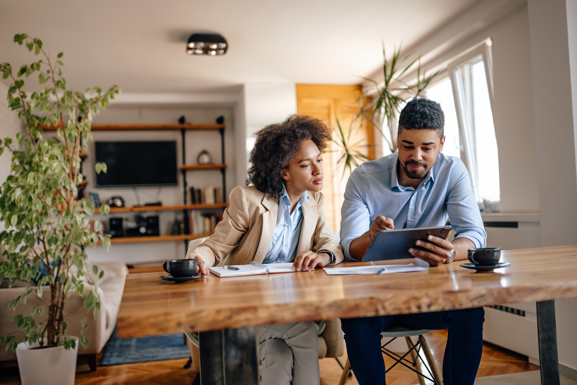 Adult couple, starting a business call.