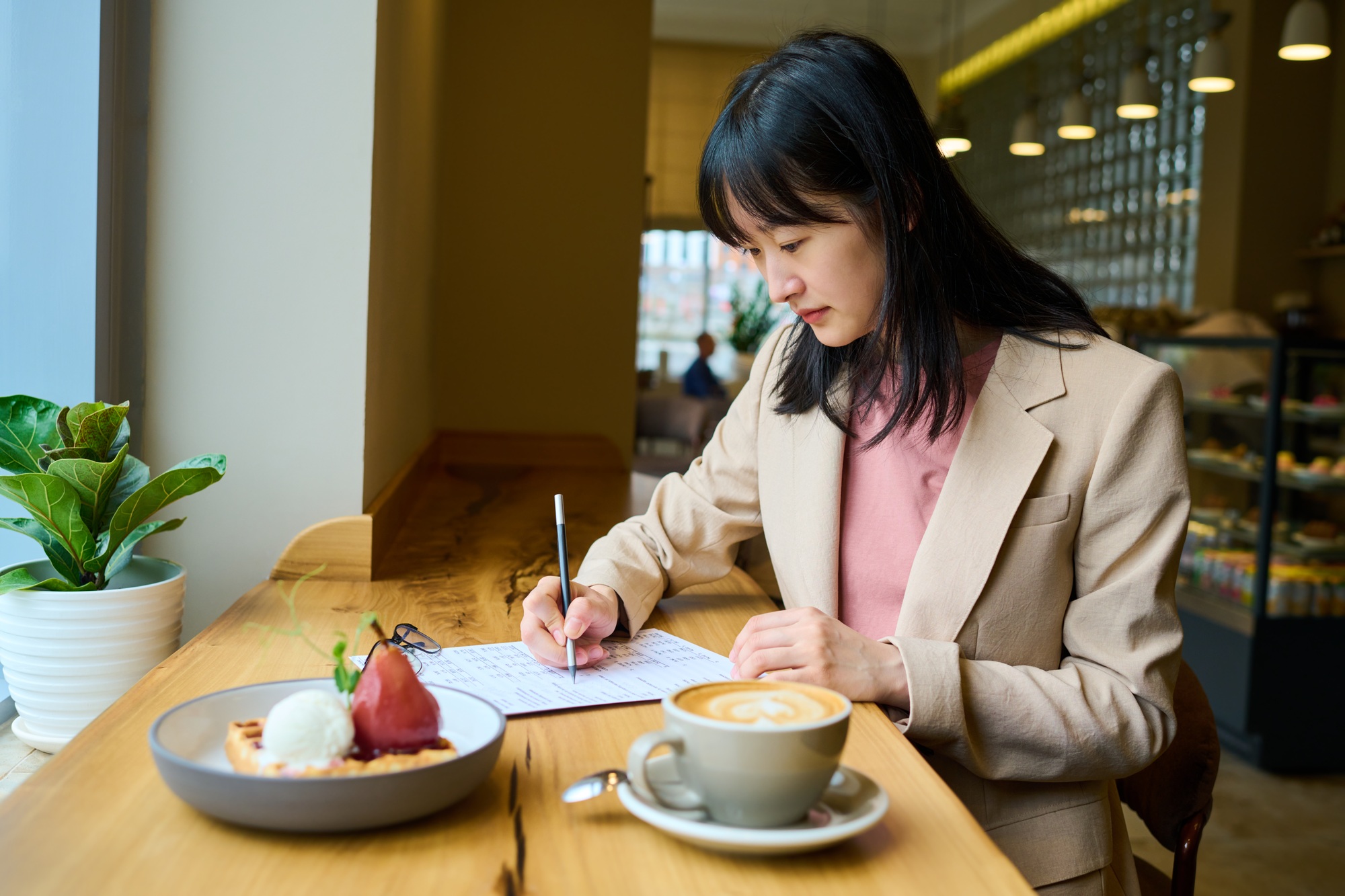Candidate filling job form in cafe