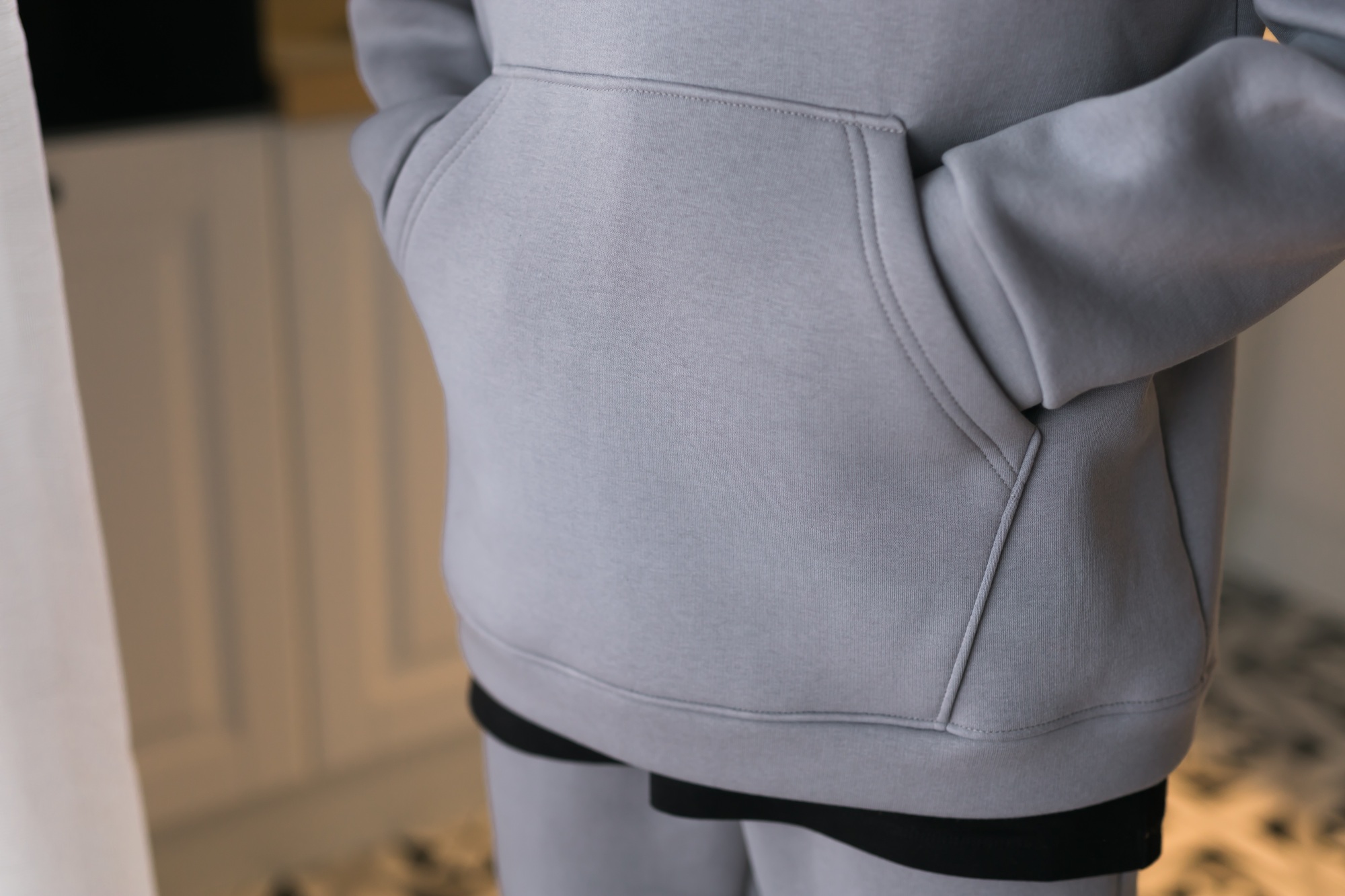 Close up of detail sweatshirt or hoodie - fabric and tailoring clothes design concept