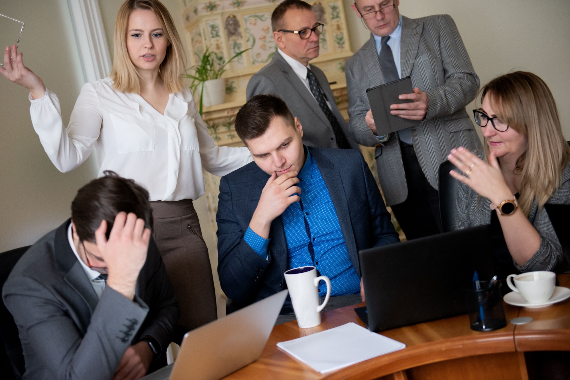 Conflict on business meeting with team at office