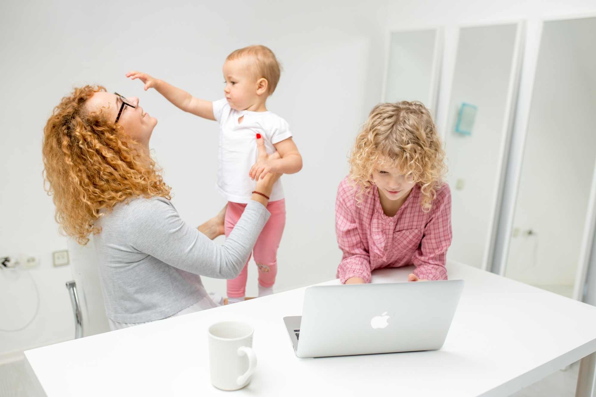 happy mom isspending time with her cute baby