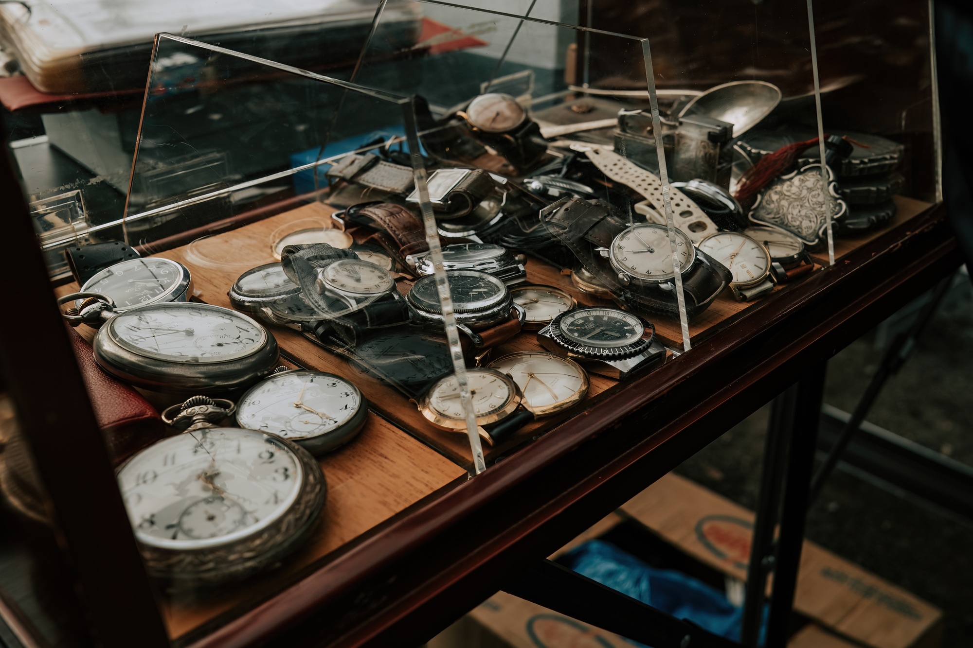 Prague, Czech - February 2023. Showcase with old watches on flea market.