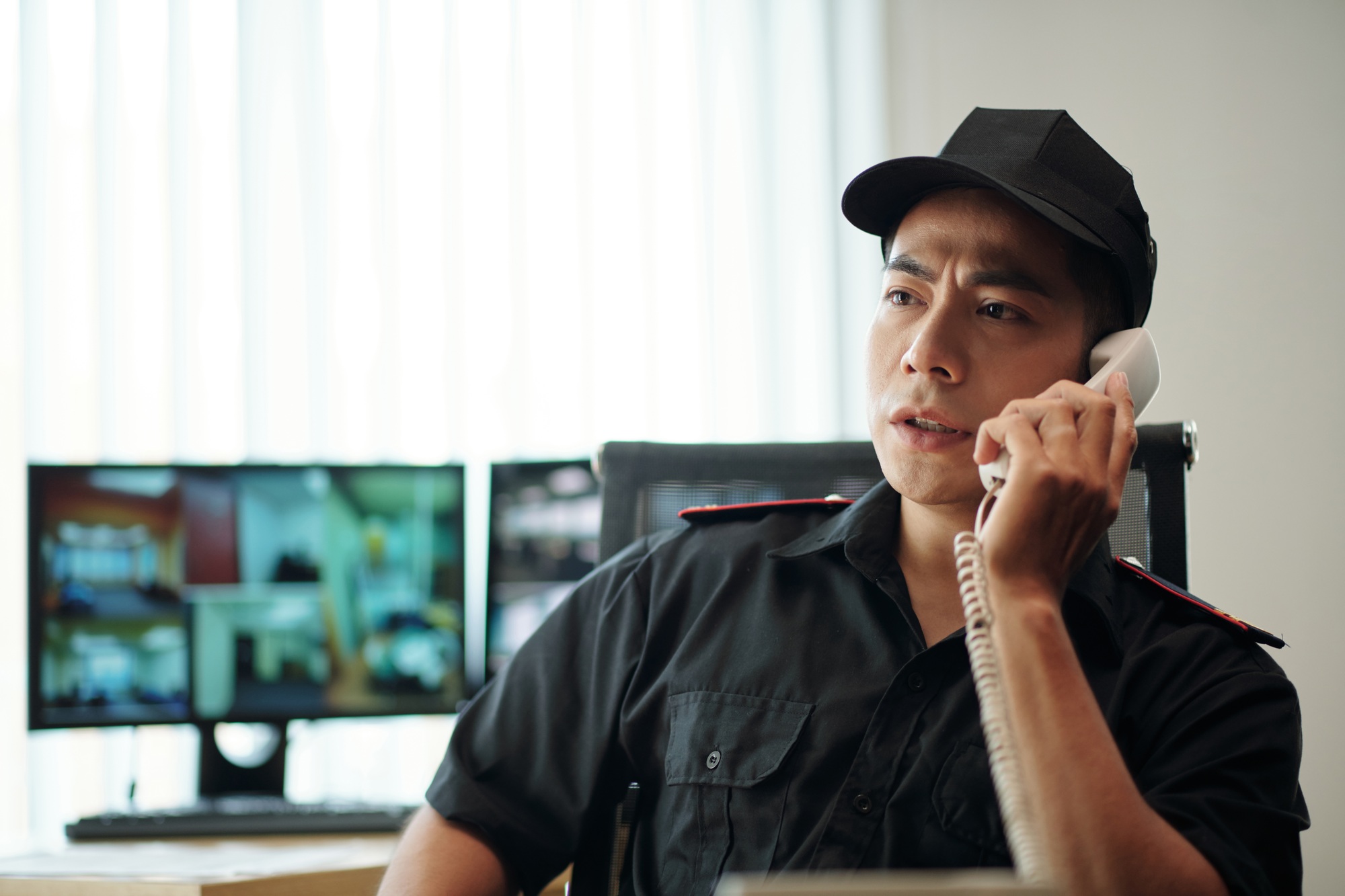 Security Guard Talking on Phone