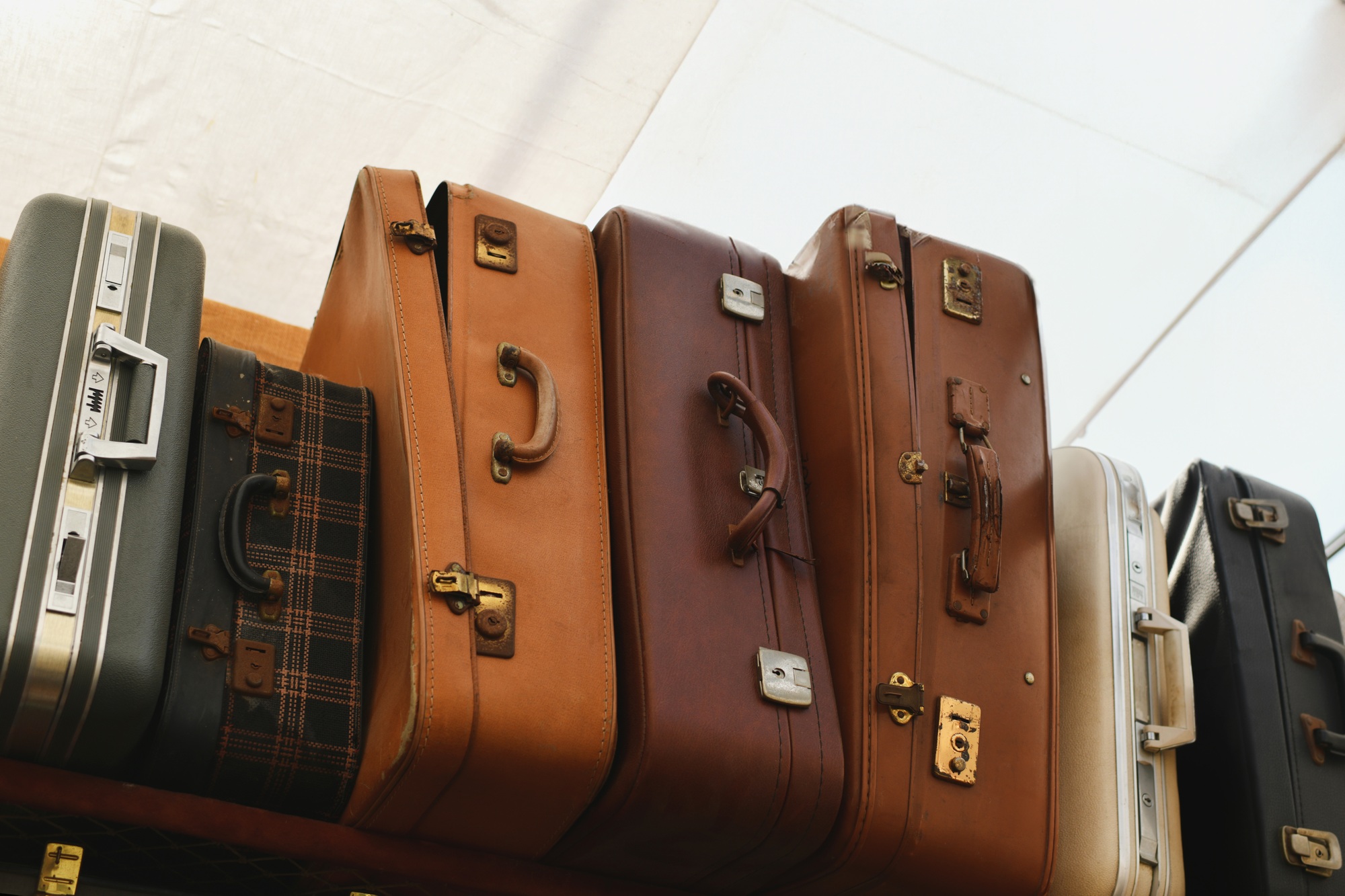 Vintage antique French suitcases at a flea market