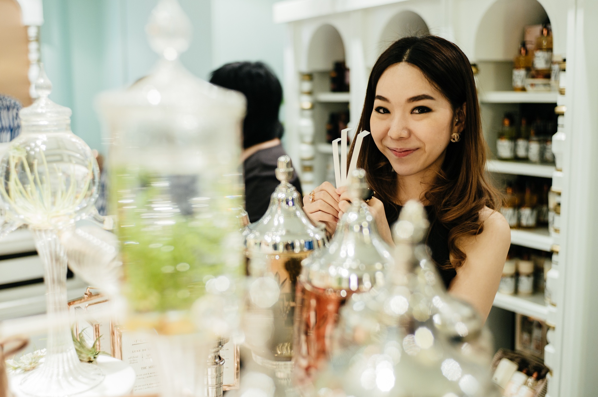 Woman making a custom perfume