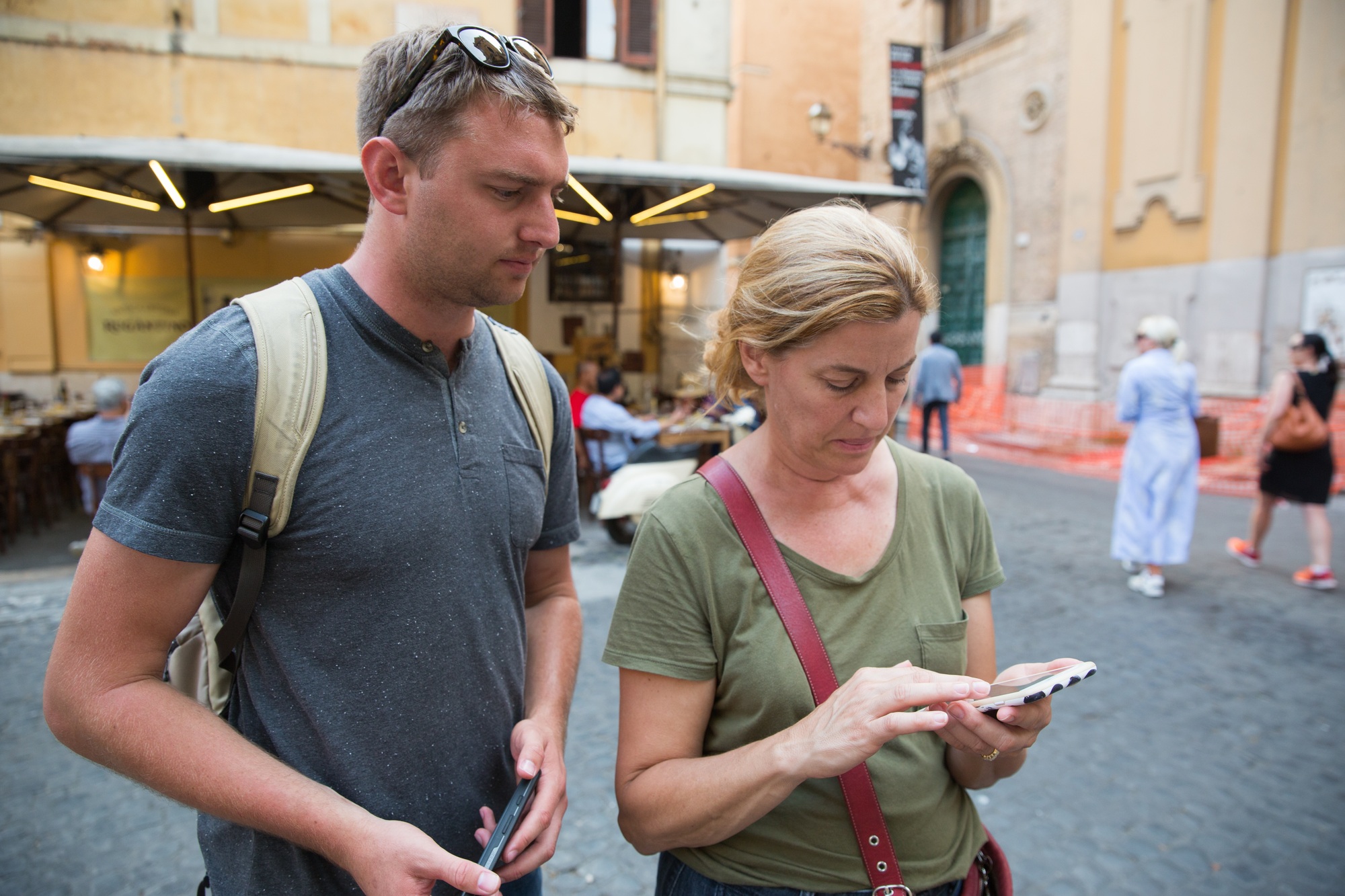A man and a woman traveling in Italy