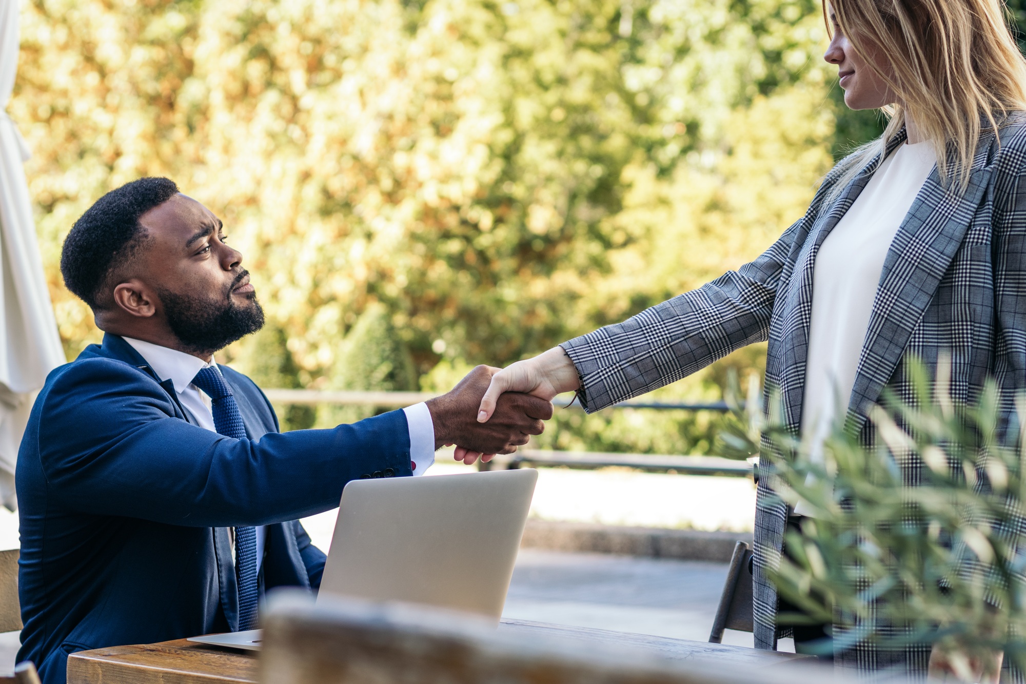 Business black man doing interview to a woman
