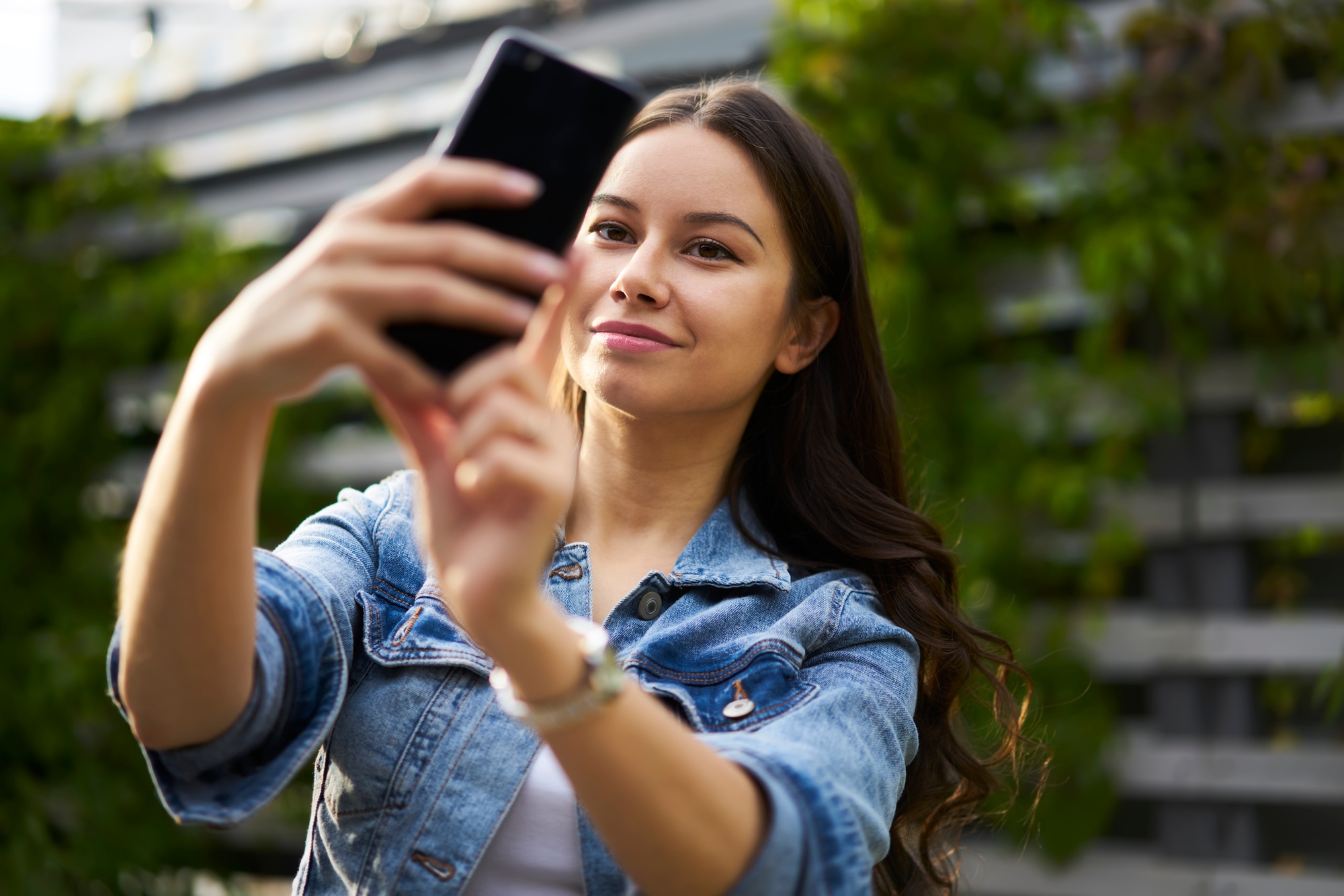 Caucasian travel girl shooting influence video vlog for sharing to social media