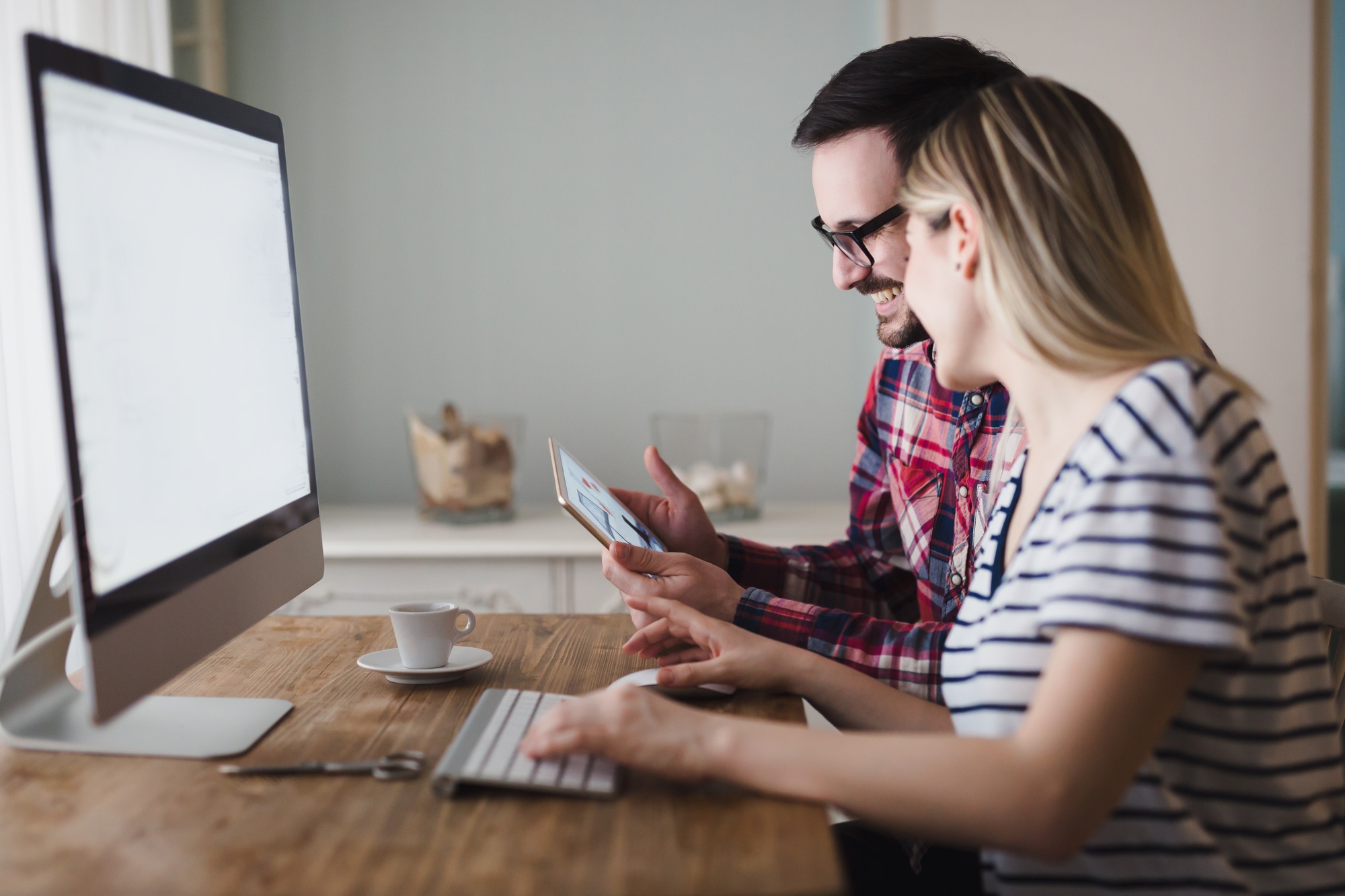 Couple with ideas working from home