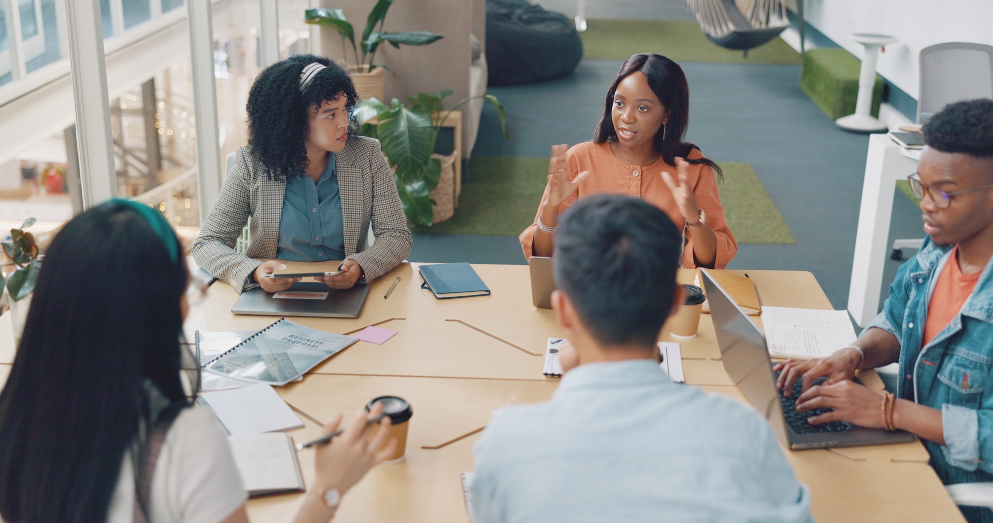 Laptop, digital marketing or creative employees in a meeting planning SEO strategy, advertising or