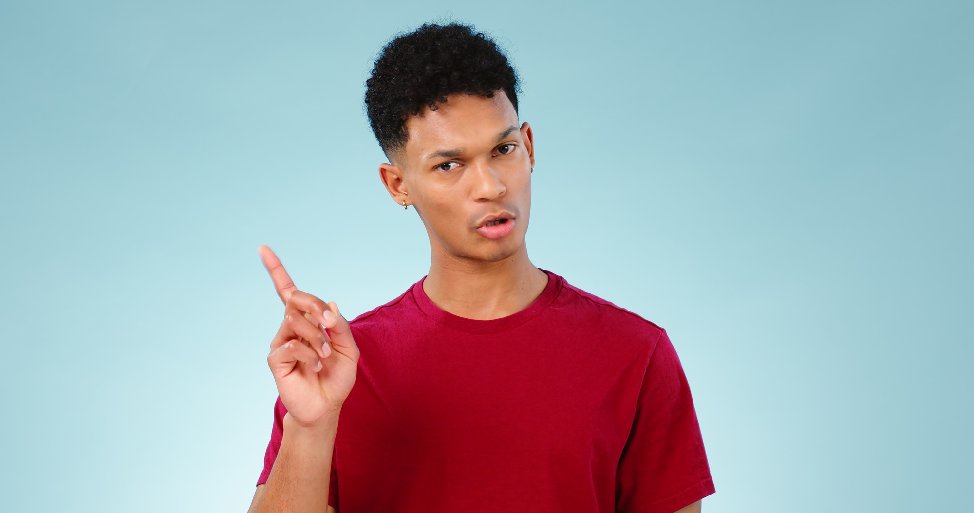 Portrait, pointing or man with promotion, announcement and information with review on blue backgrou