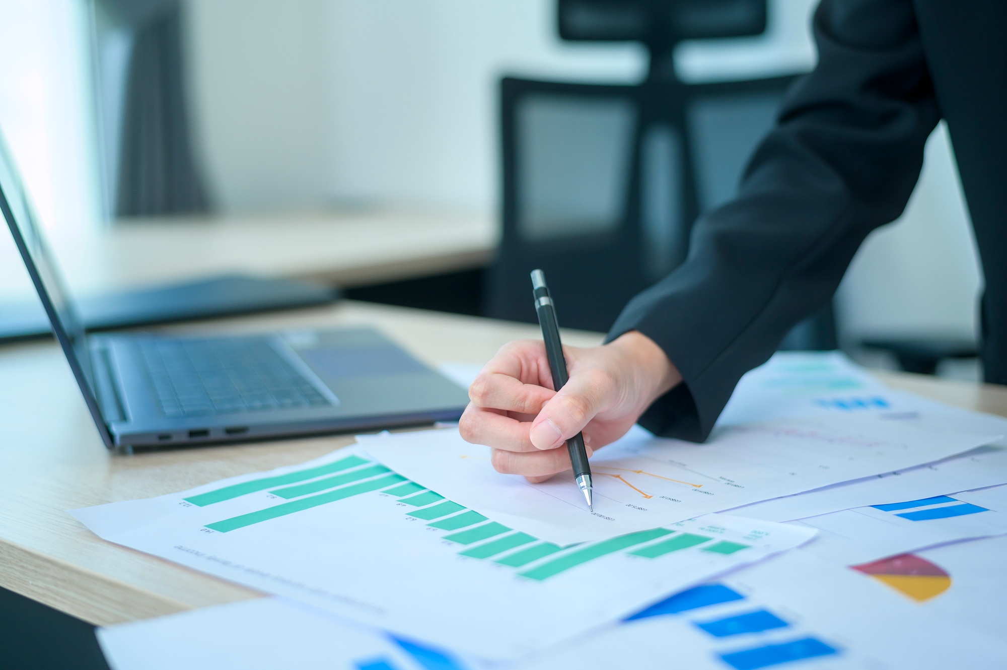Top view of Documents with analytics data lying