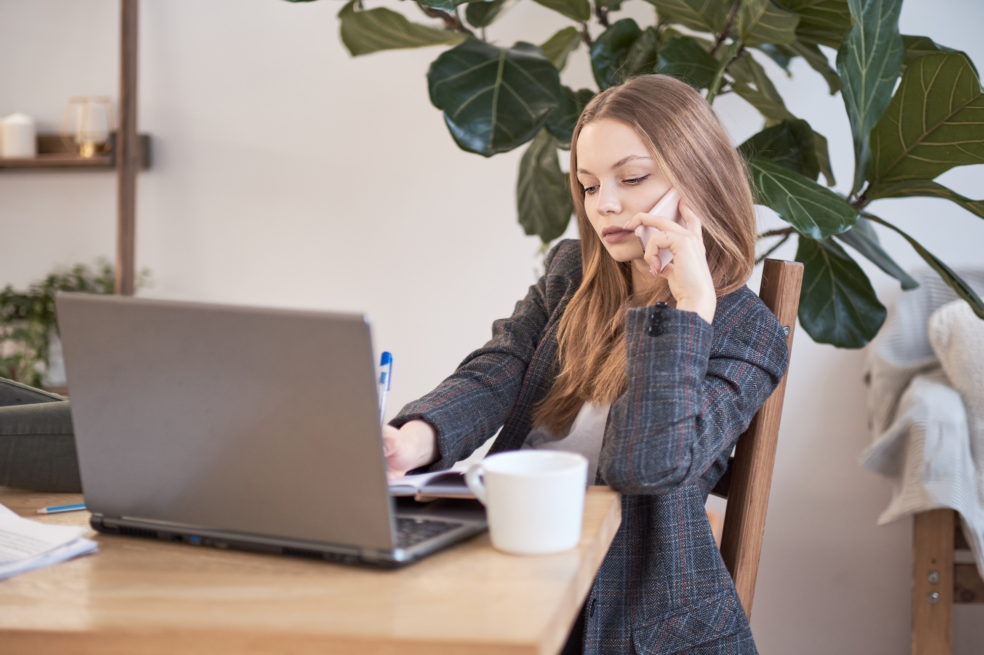 woman works at home or in a business incubator. freelancing concept. relaxed in the workplace