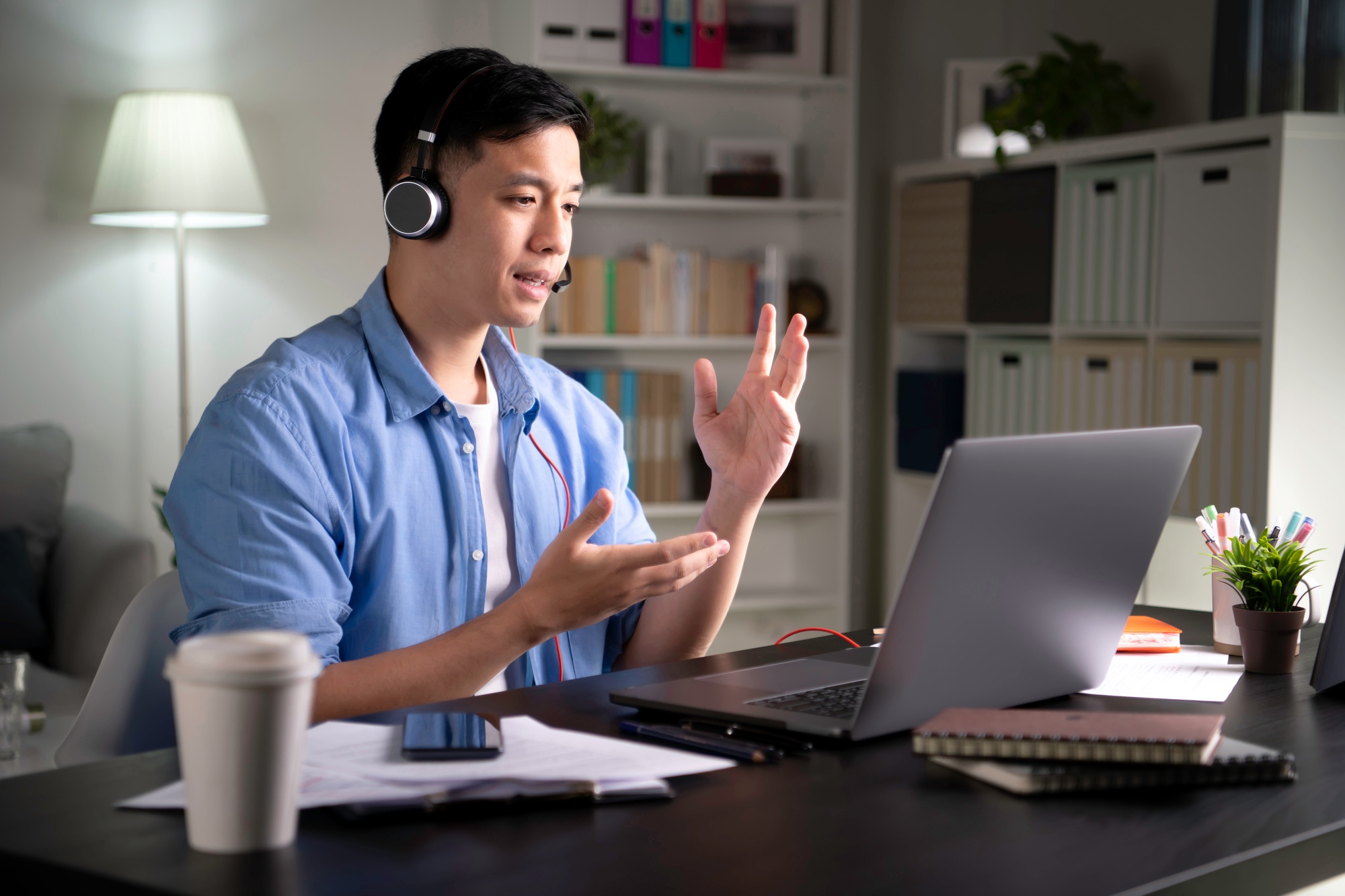 Asian man making video call