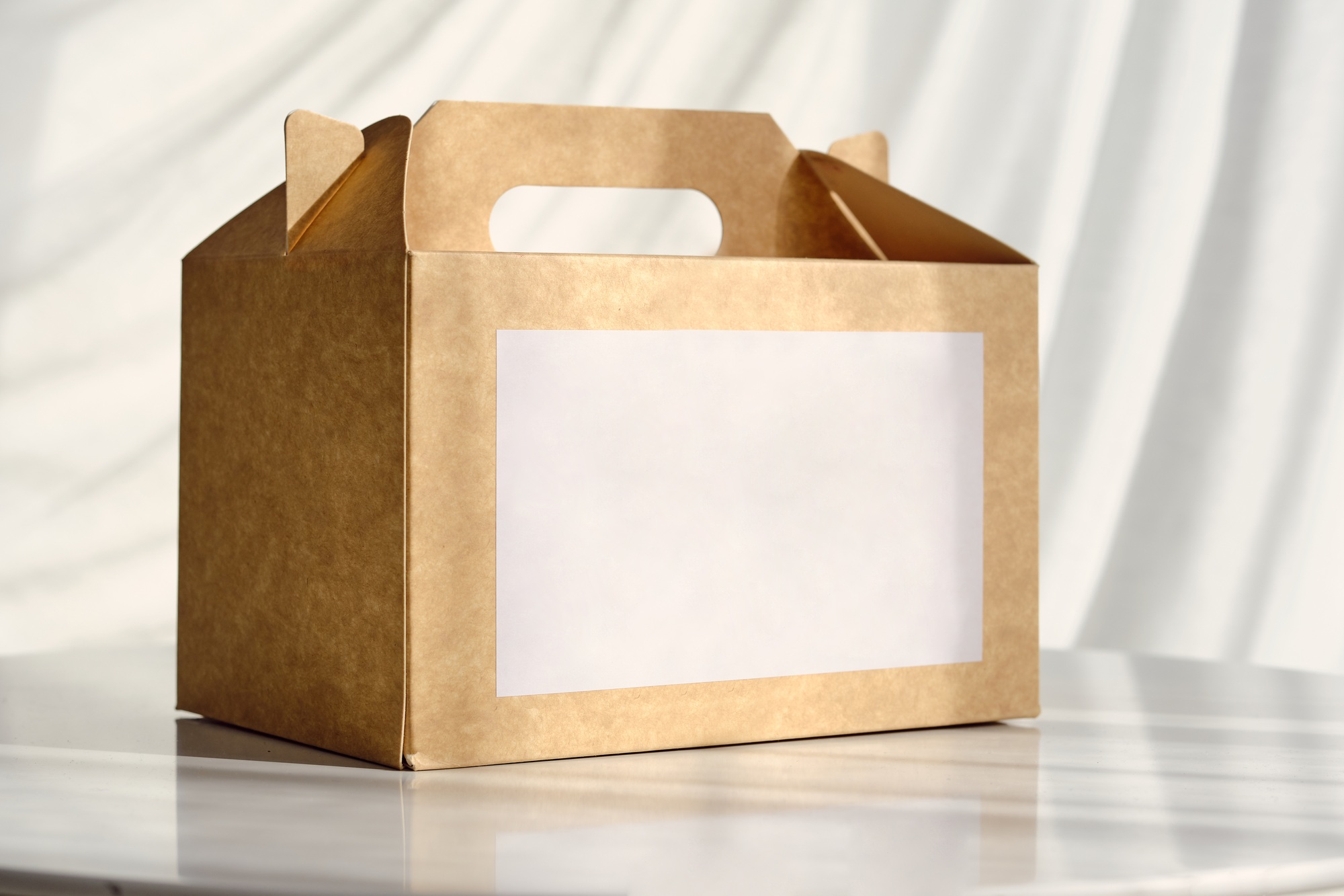 Cardboard box for delivery service on table