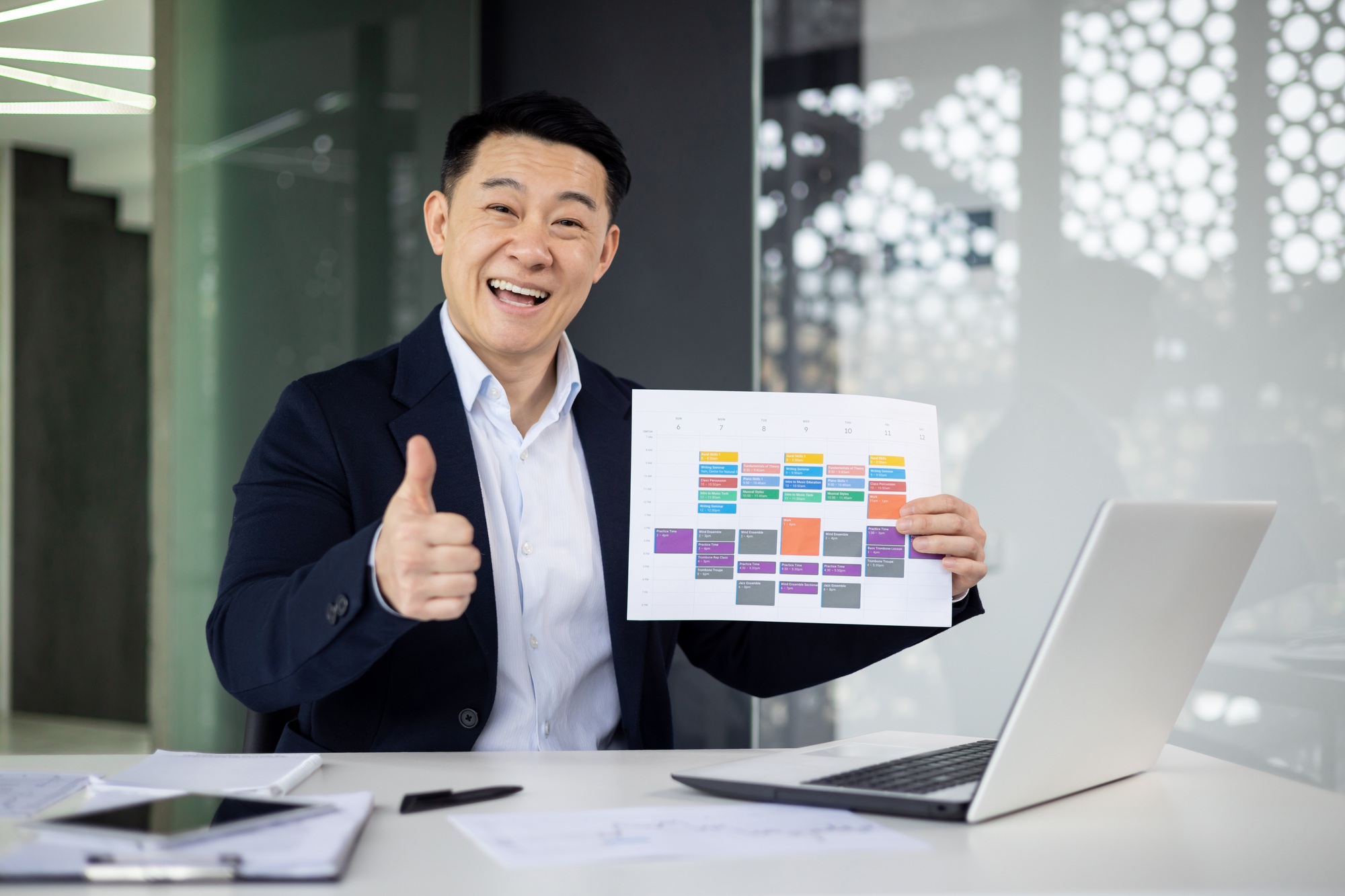 Confident businessman presenting project timeline in office
