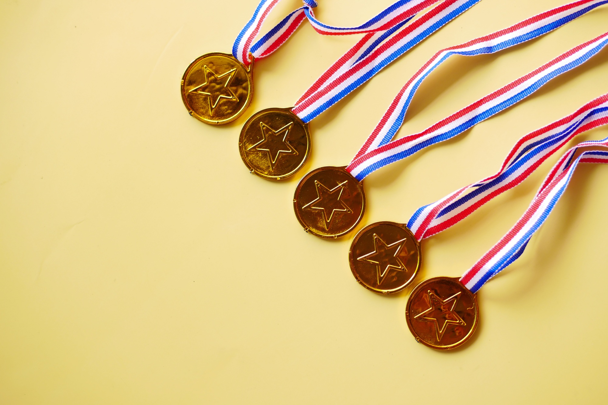 Customer review concept. Rating golden stars on blue background