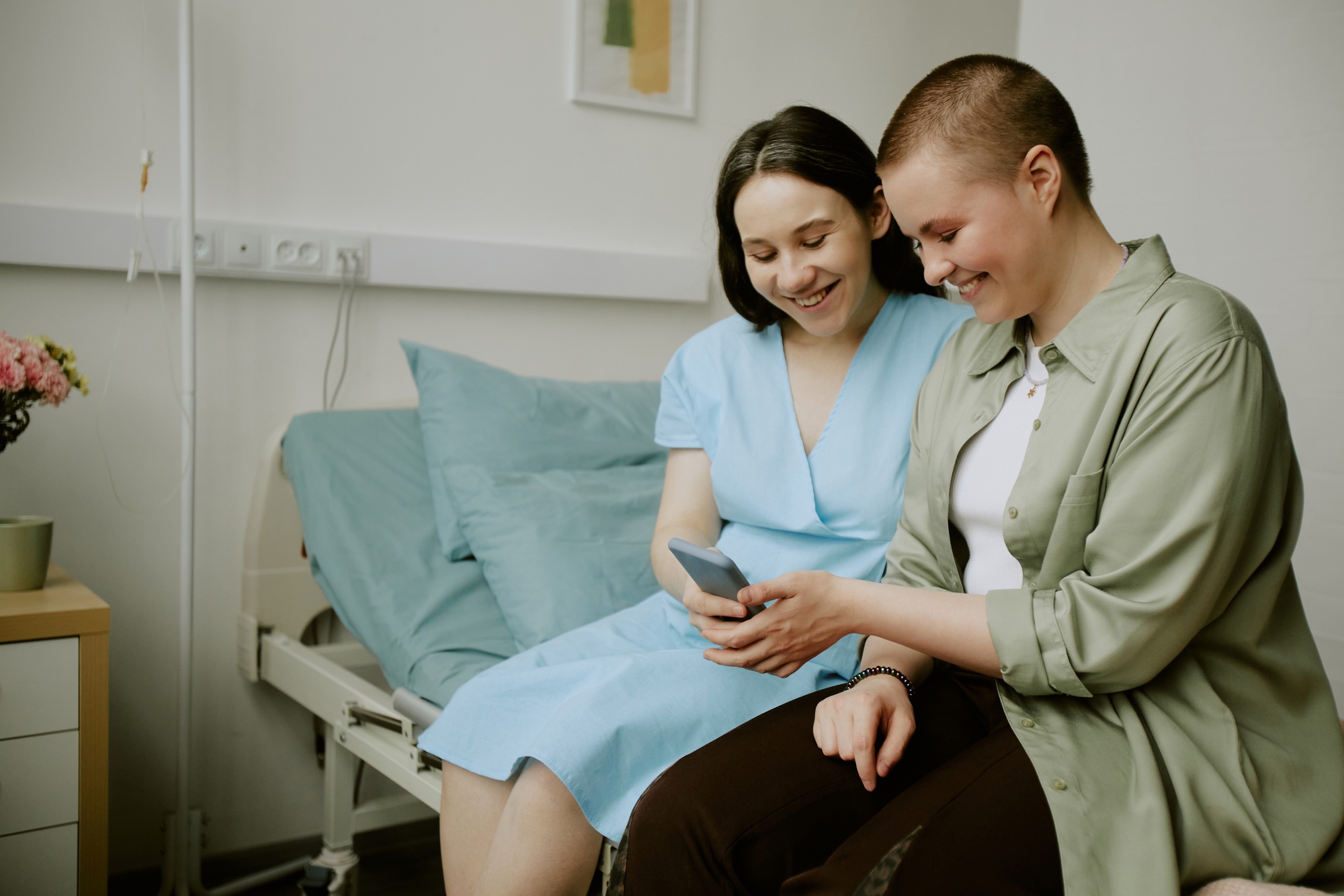 Friend Surfing Internet at Maternity Hospital