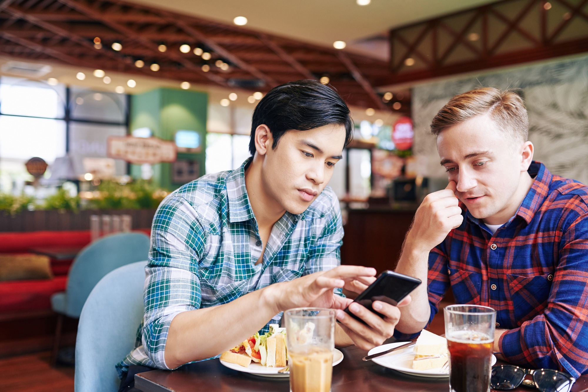 Friends discussing dating app