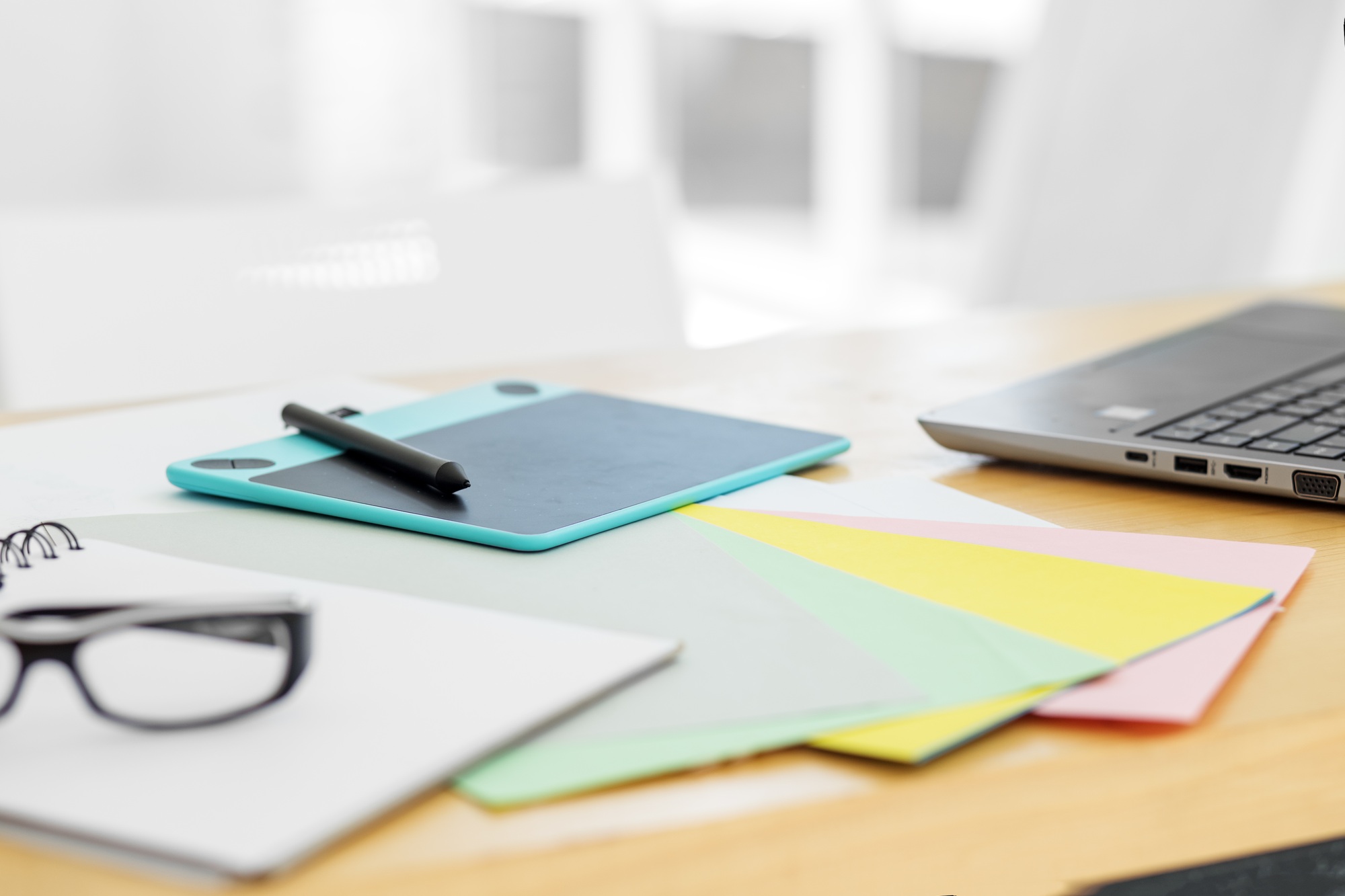 Graphics tablet on the desktop. Free space for text. Office workplace