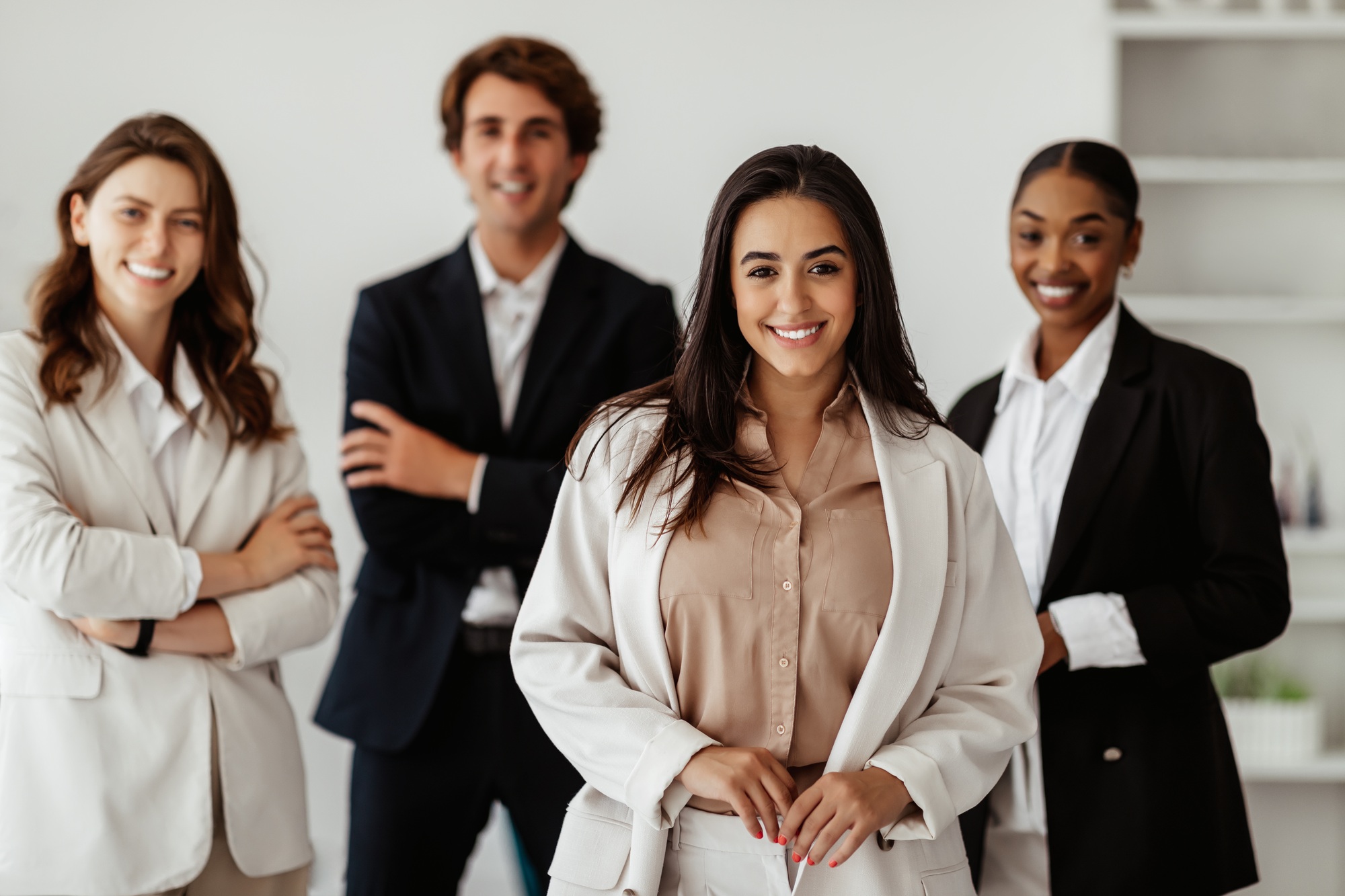 Leadership and entrepreneurship career. Positive latin businesswoman leader standing in front of