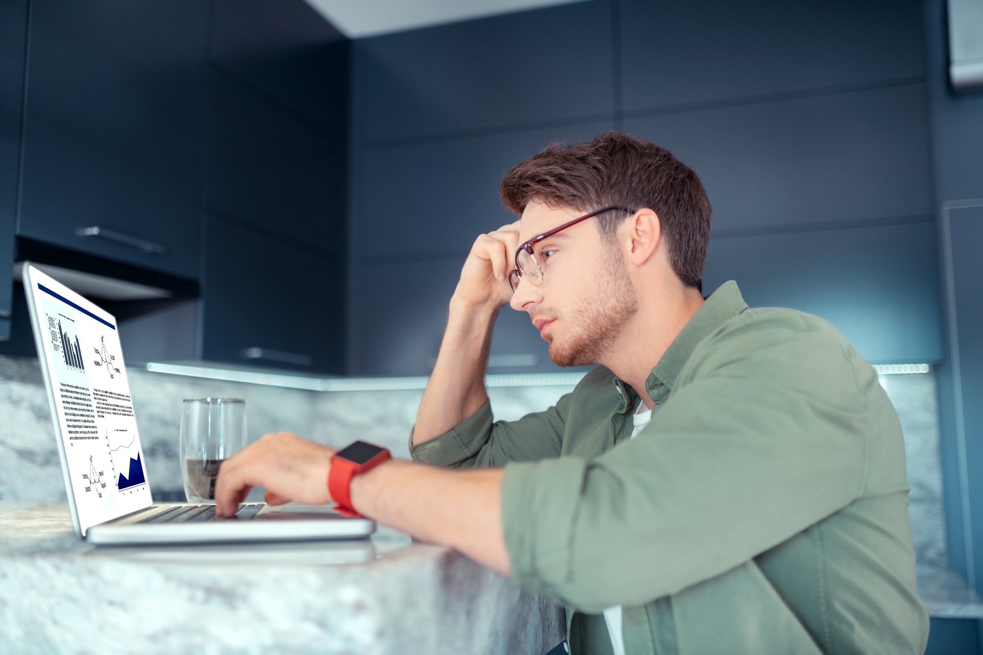 Man feeling overloaded while working from home