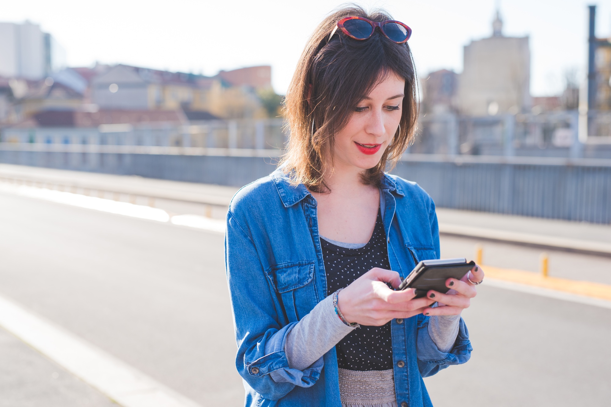 portrait of young woman using smartphone