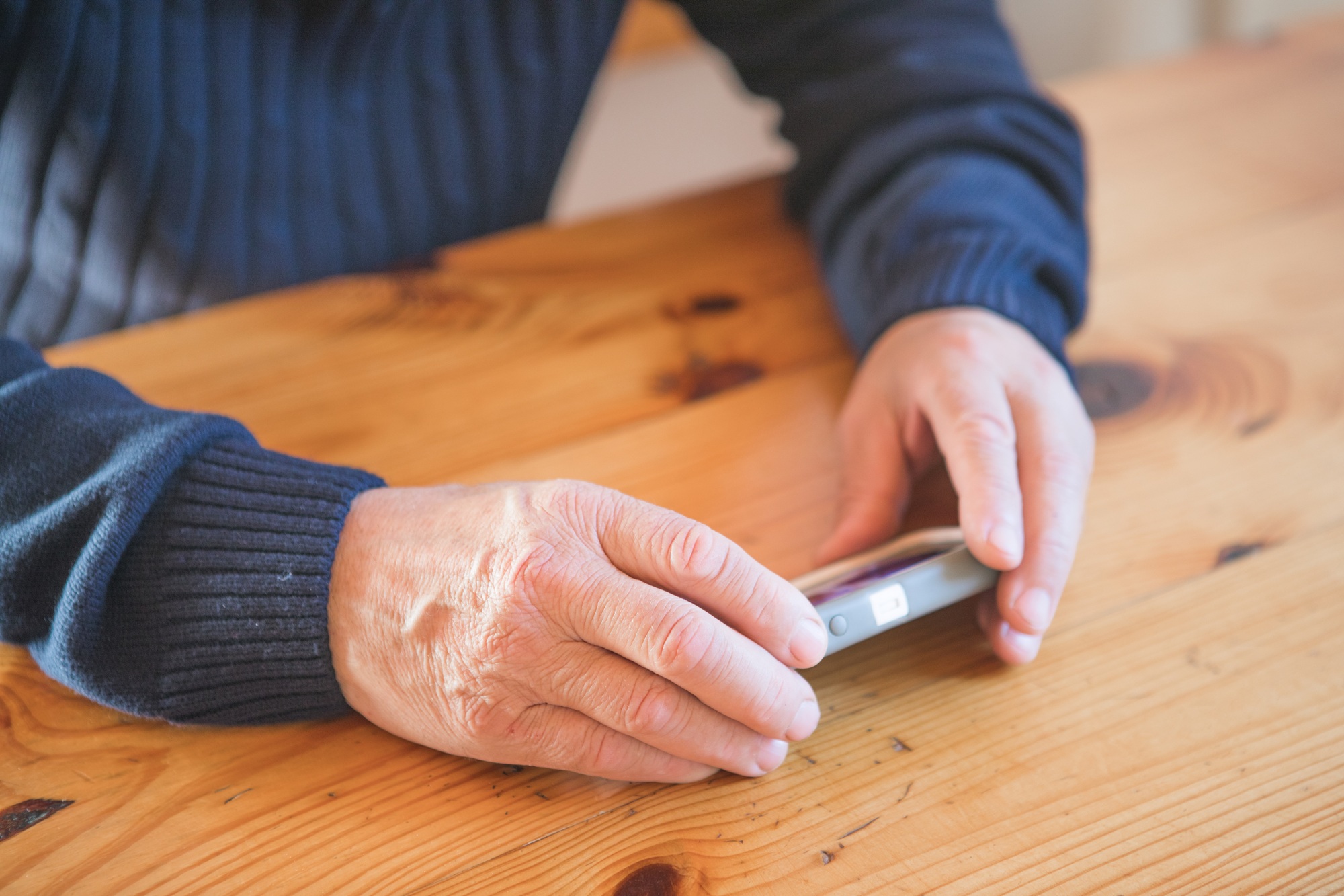 Senior businessman using mobile phone.Elderly senior people society lifestyle technology concept.
