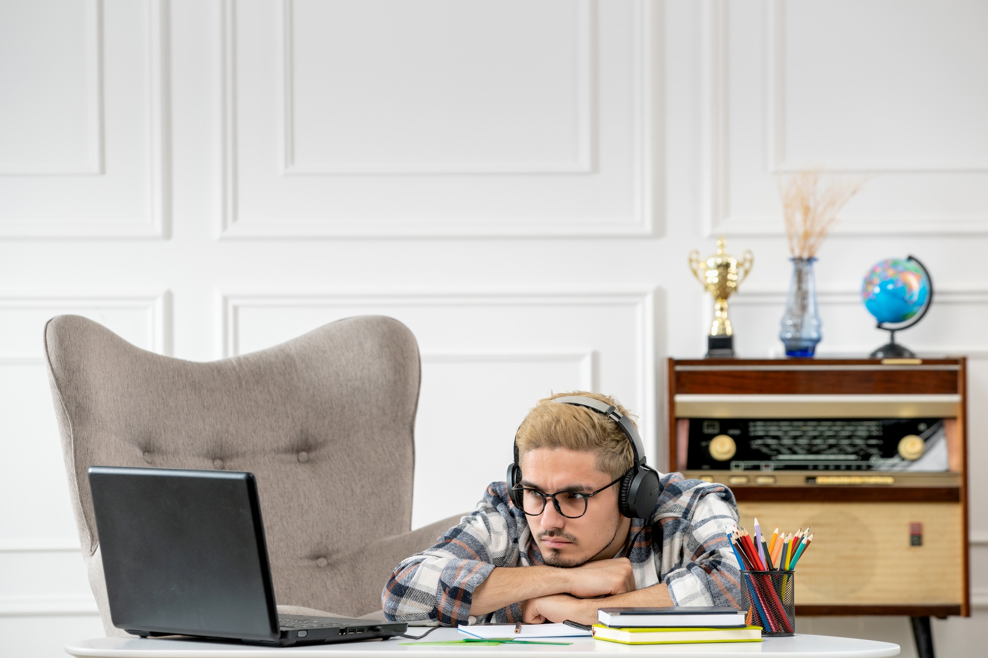student remote studying online young cute guy on computer at home on zoom call