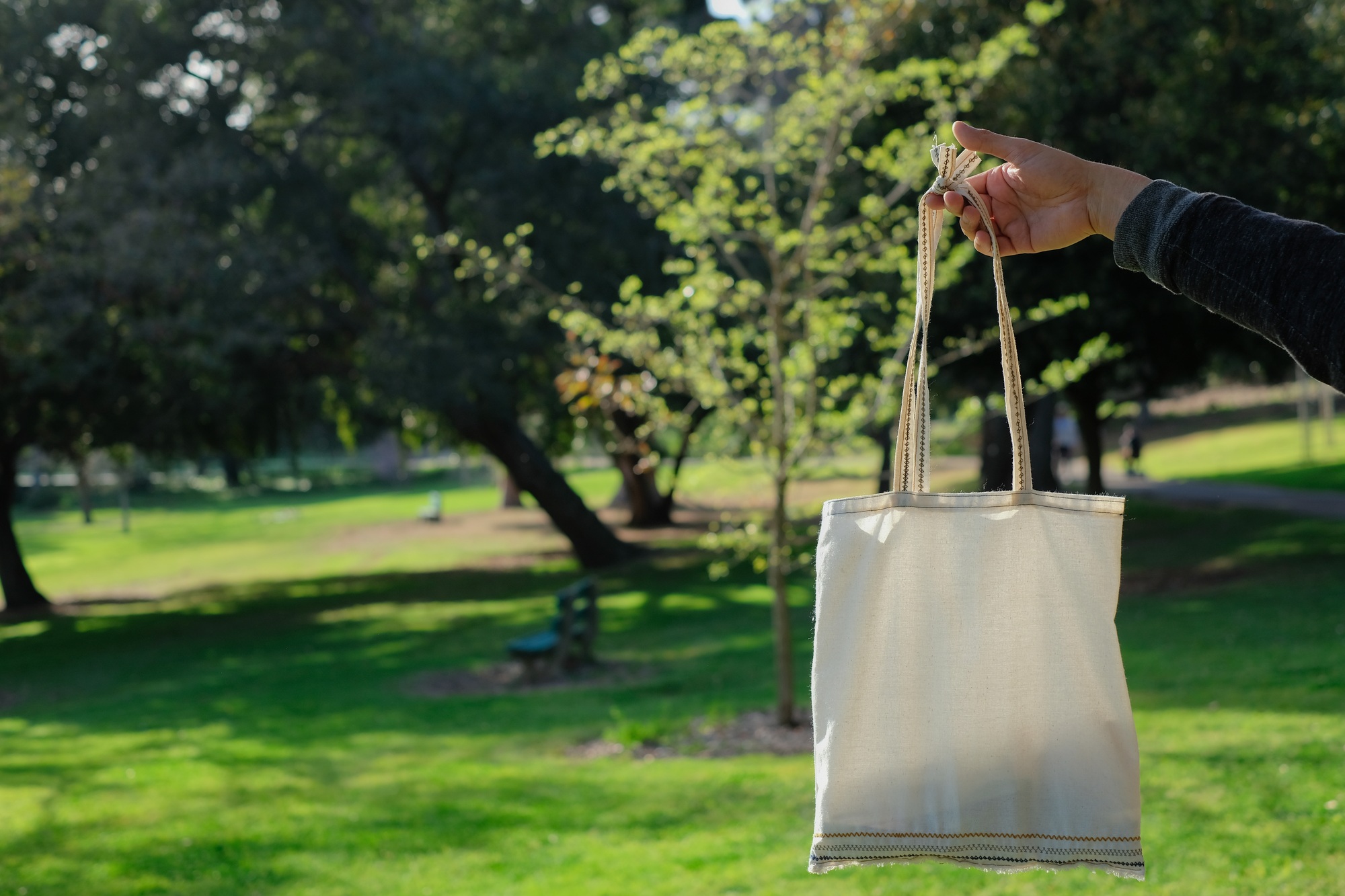 Woman carry the re useable bag outdoor. eco friendly and sustainability life.