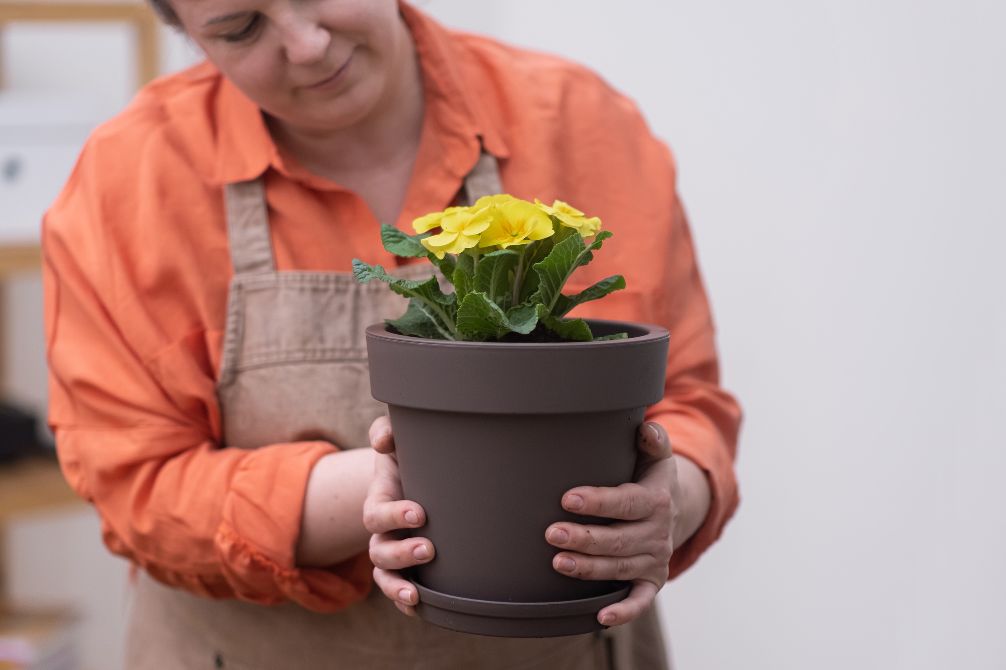 woman opening a small business plant store to share your passion for plants