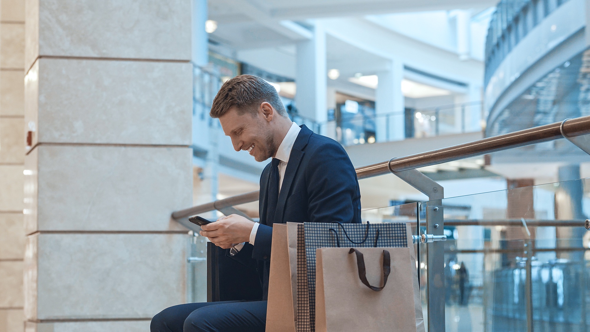 Young businessman printing a message