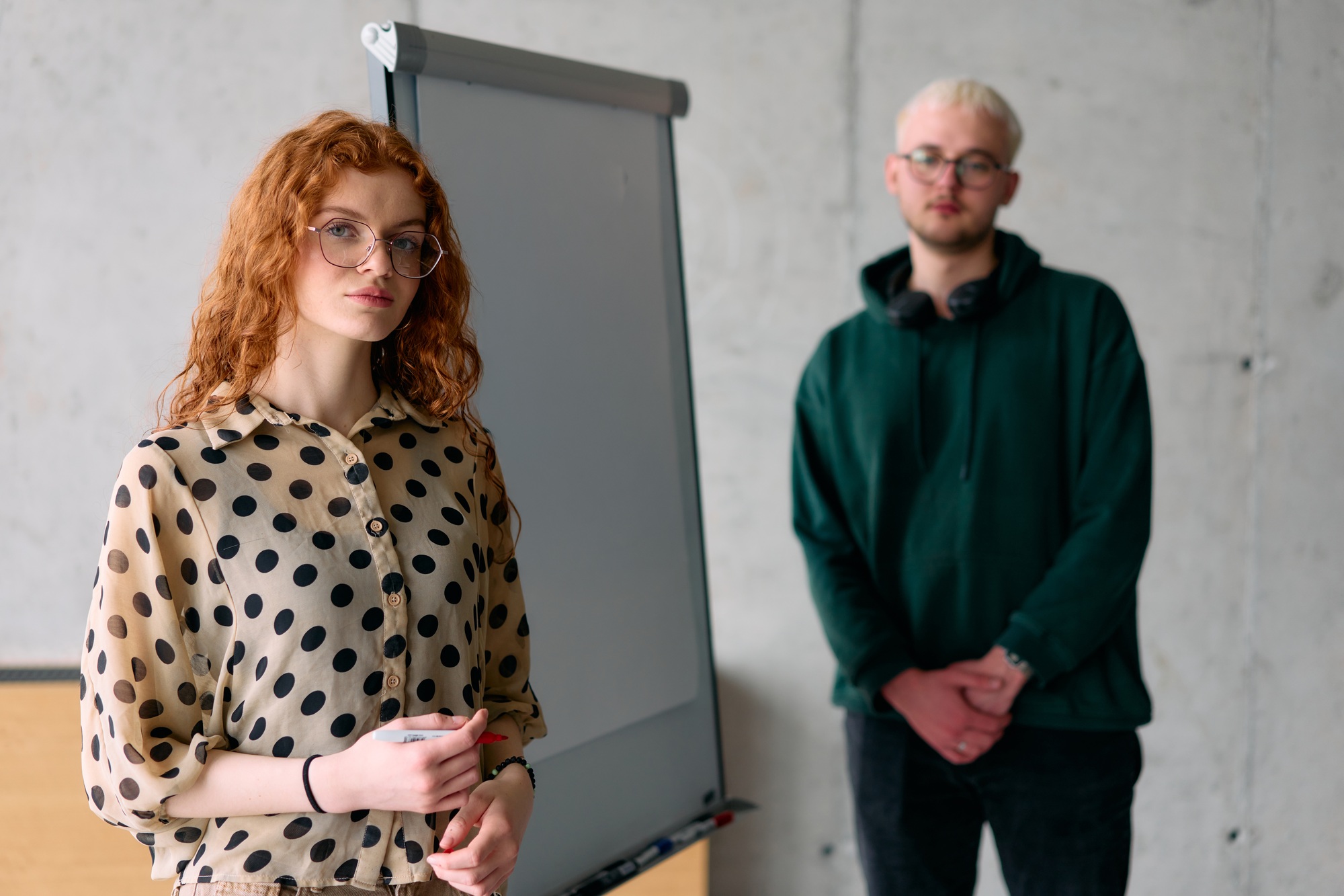 A business colleague collaboratively presenting business goals and strategies to their team in a