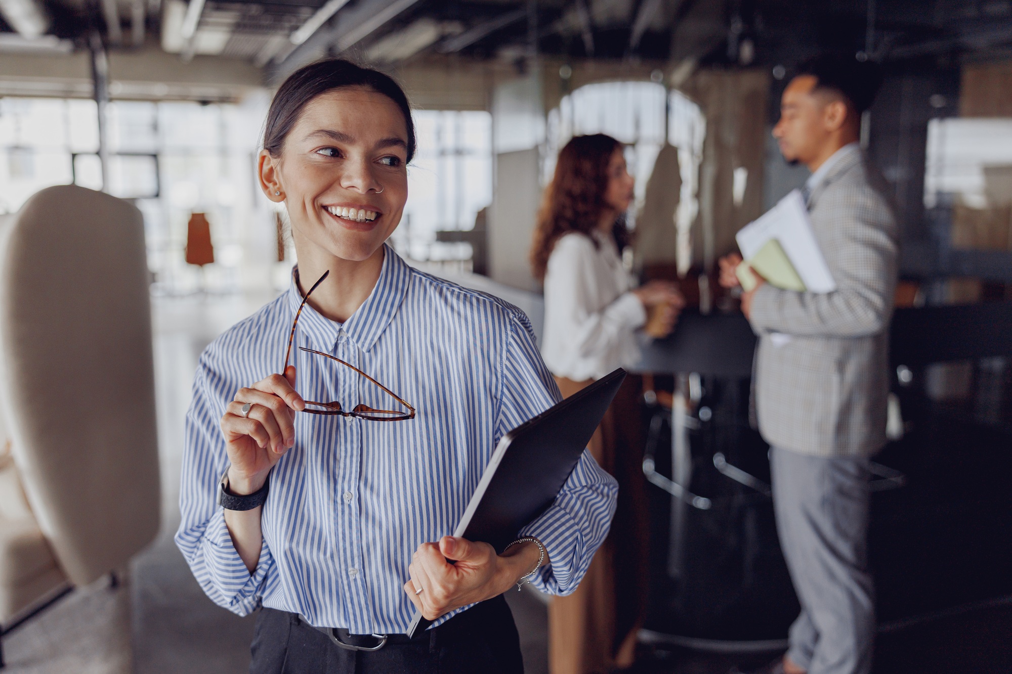 A Confident Businesswoman Thriving in a Modern Office Environment and Setting New Goals