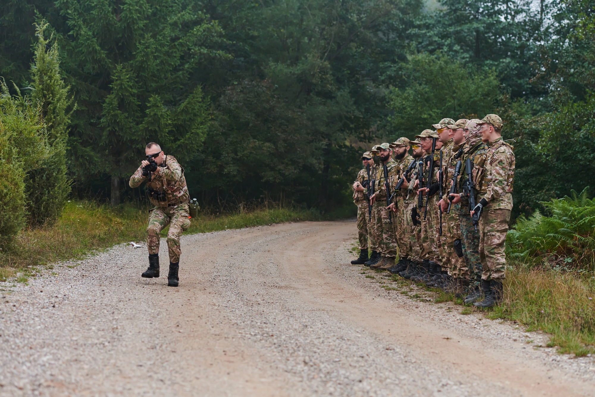 A major imparts precise military instructions to his elite unit, embodying strategic leadership as