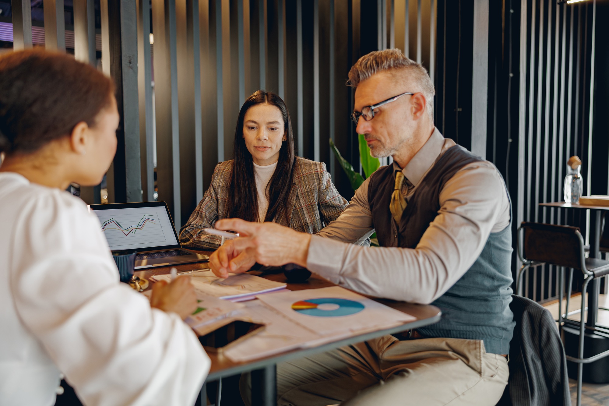 A Professional Business Meeting Engaging in InDepth Discussions About Financial Strategies