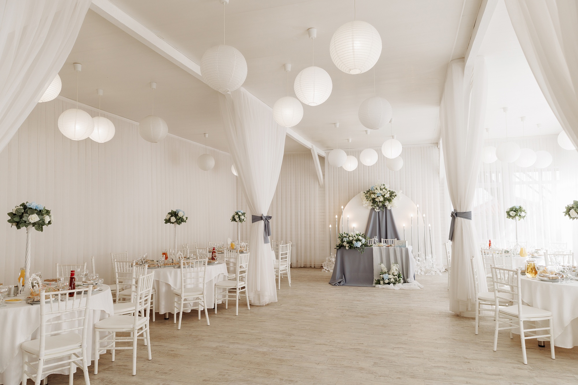 A view inside a marquee set up for a wedding reception