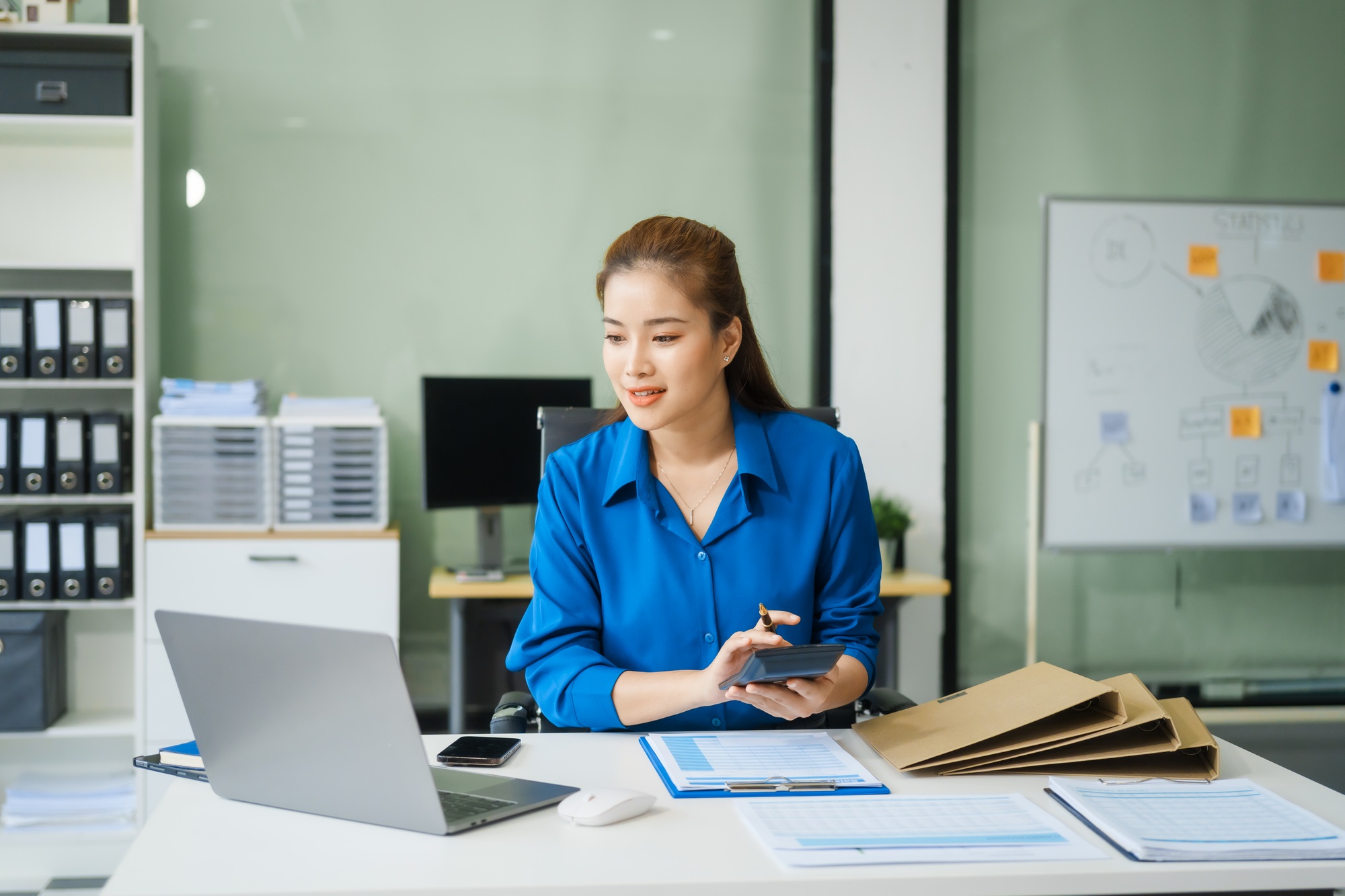 A young businesswoman financial advisor, skilled in stock market loans,entrepreneurship,strategic