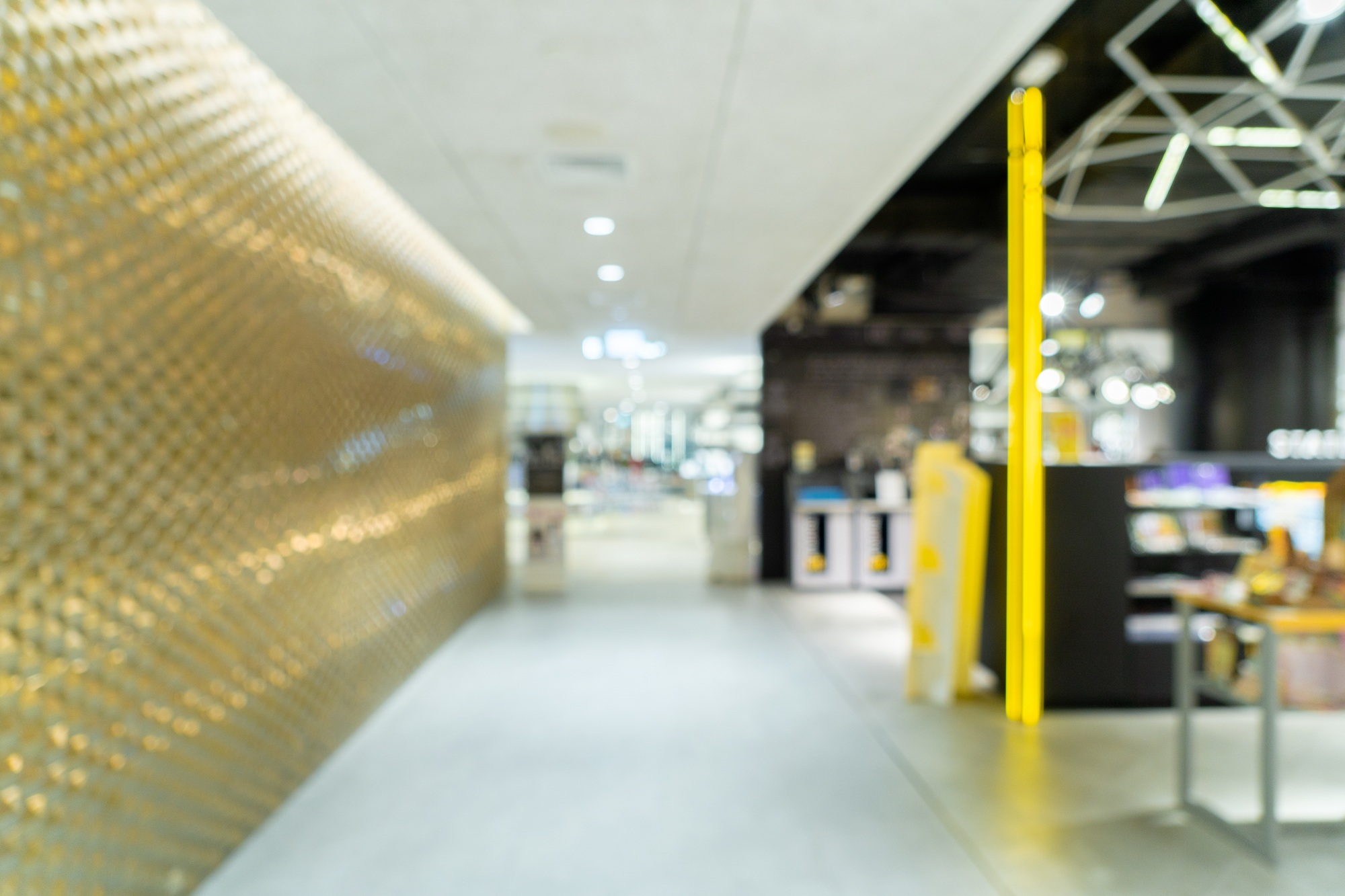 Abstract blurry background of retail shops in shopping mall or department store
