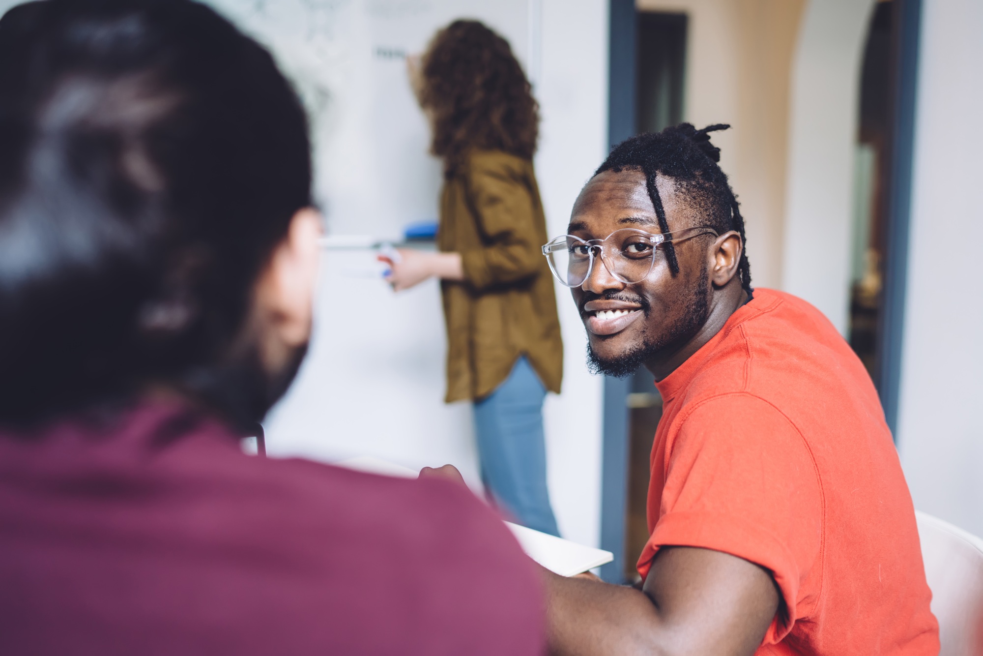 African American man with colleagues participating in business training