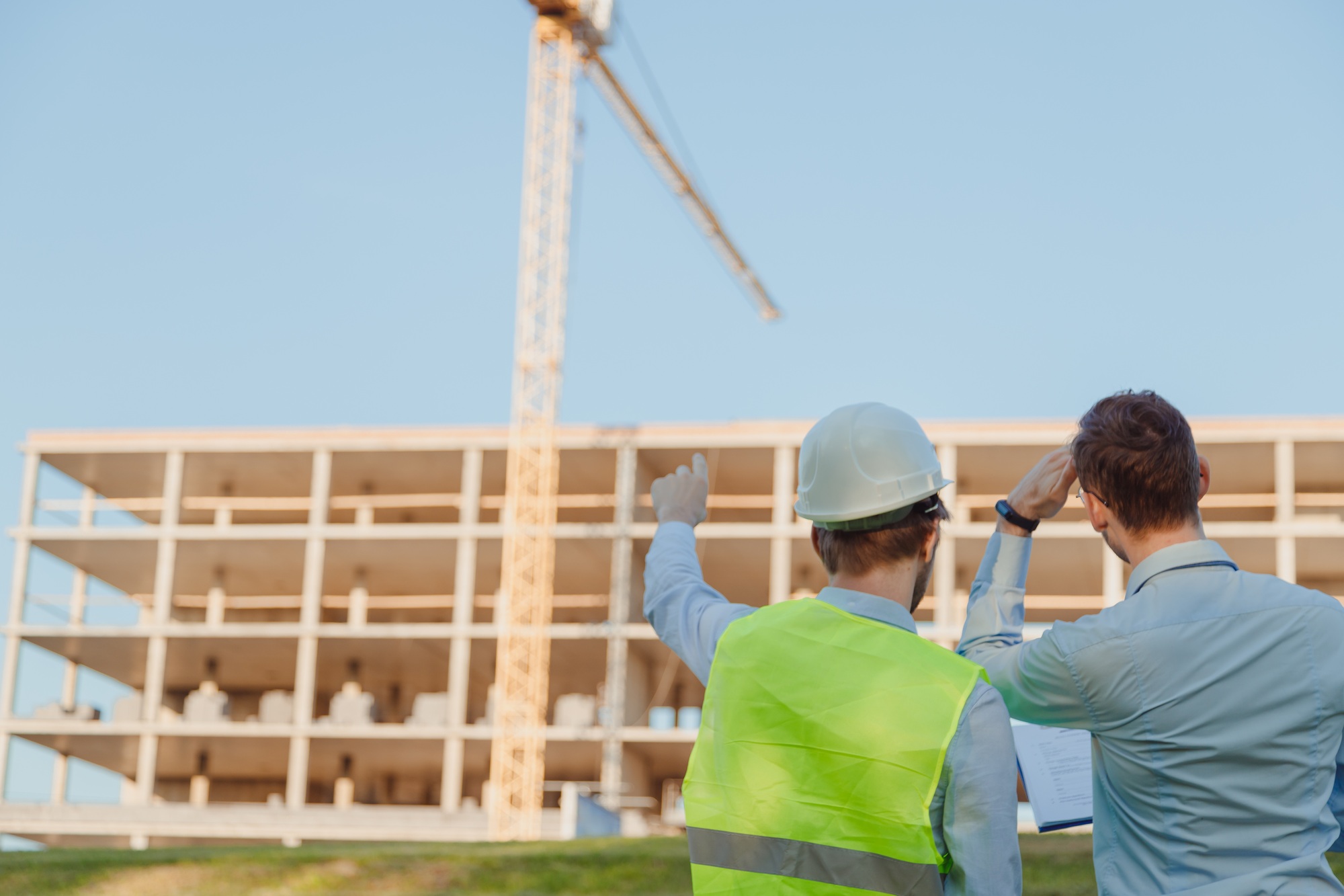 architect shows the customer a new building, copyspace