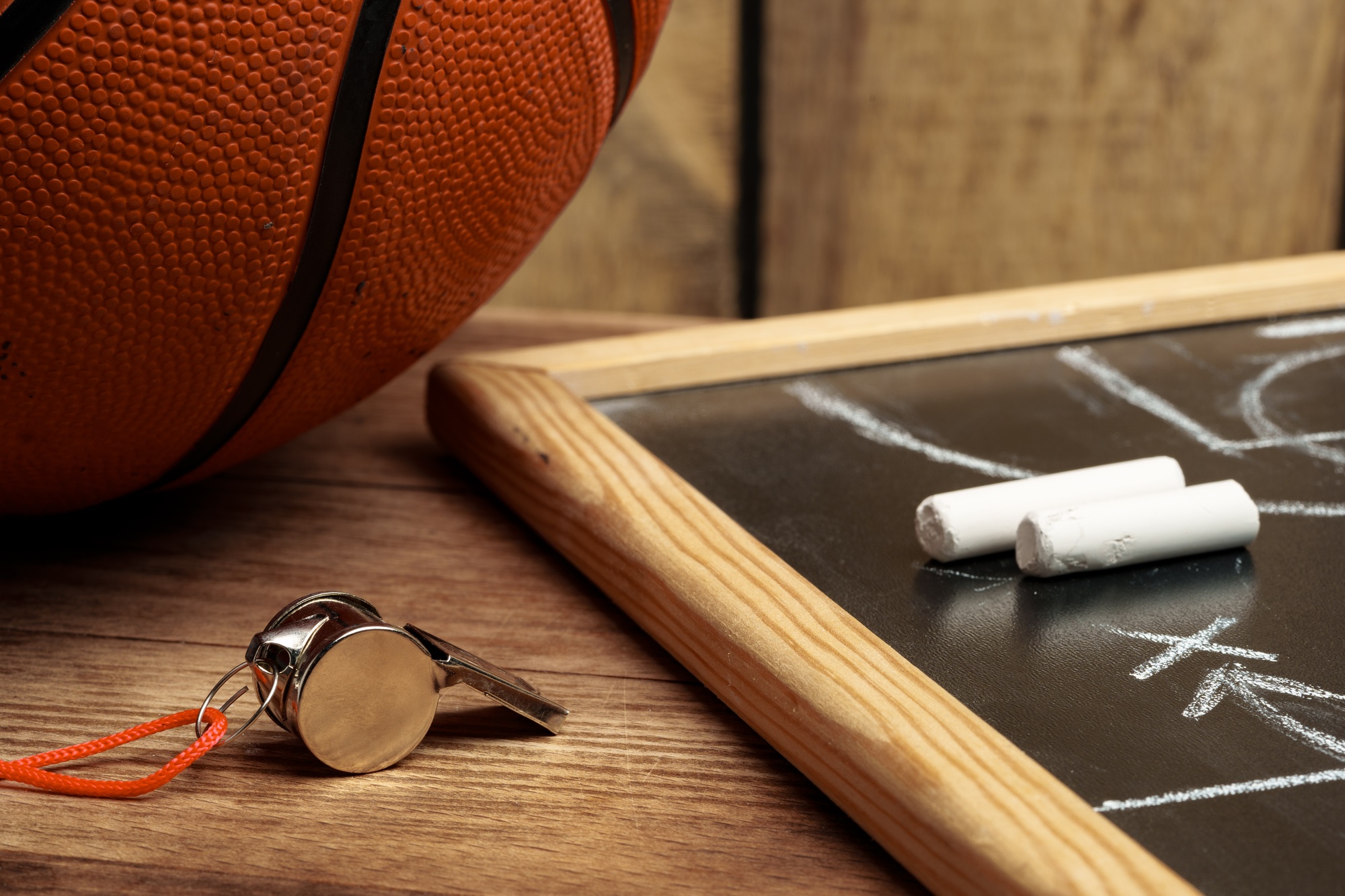 Basketball ball with chalkboard strategy planning close up