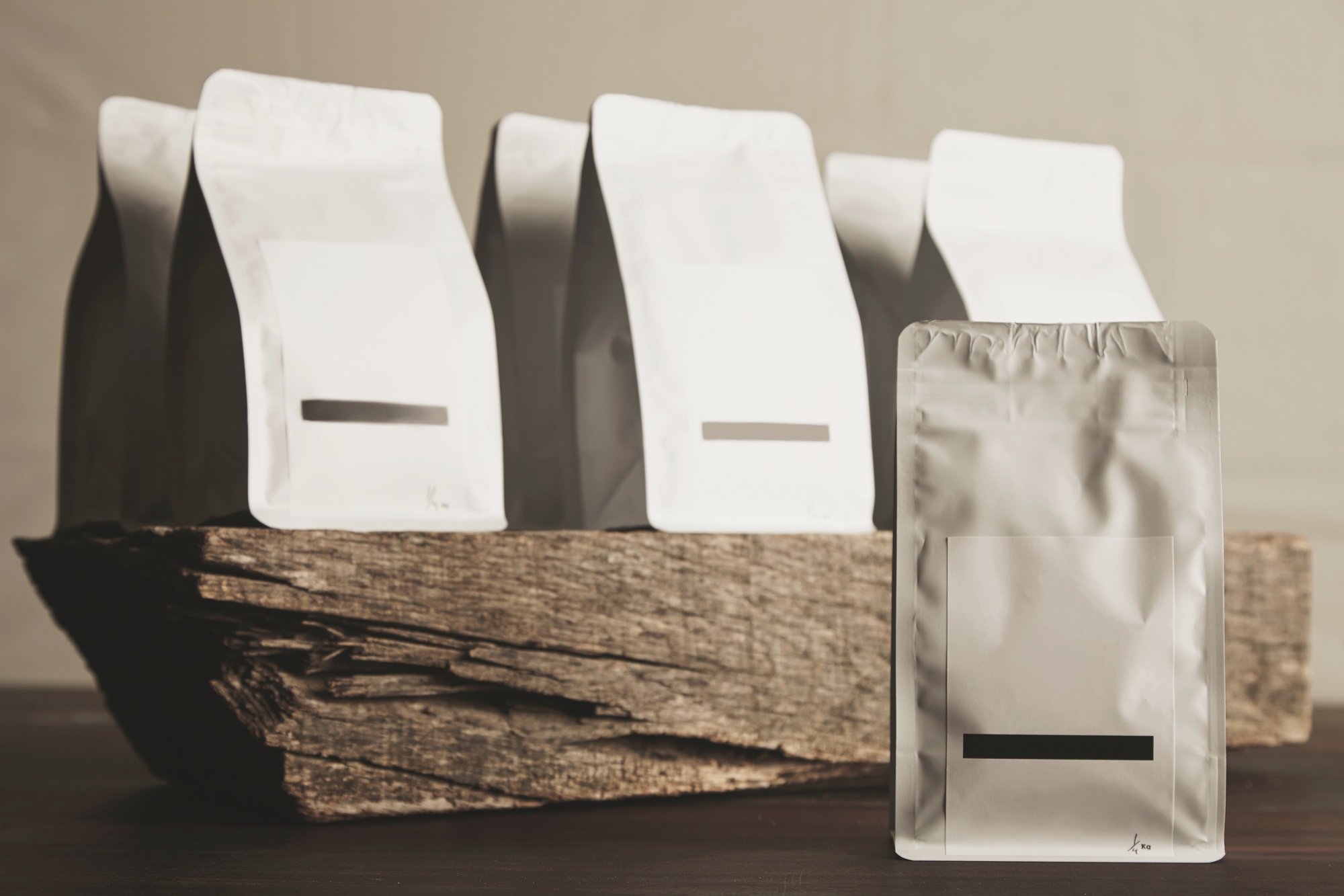Blank sealed white packages with product inside ready for sale