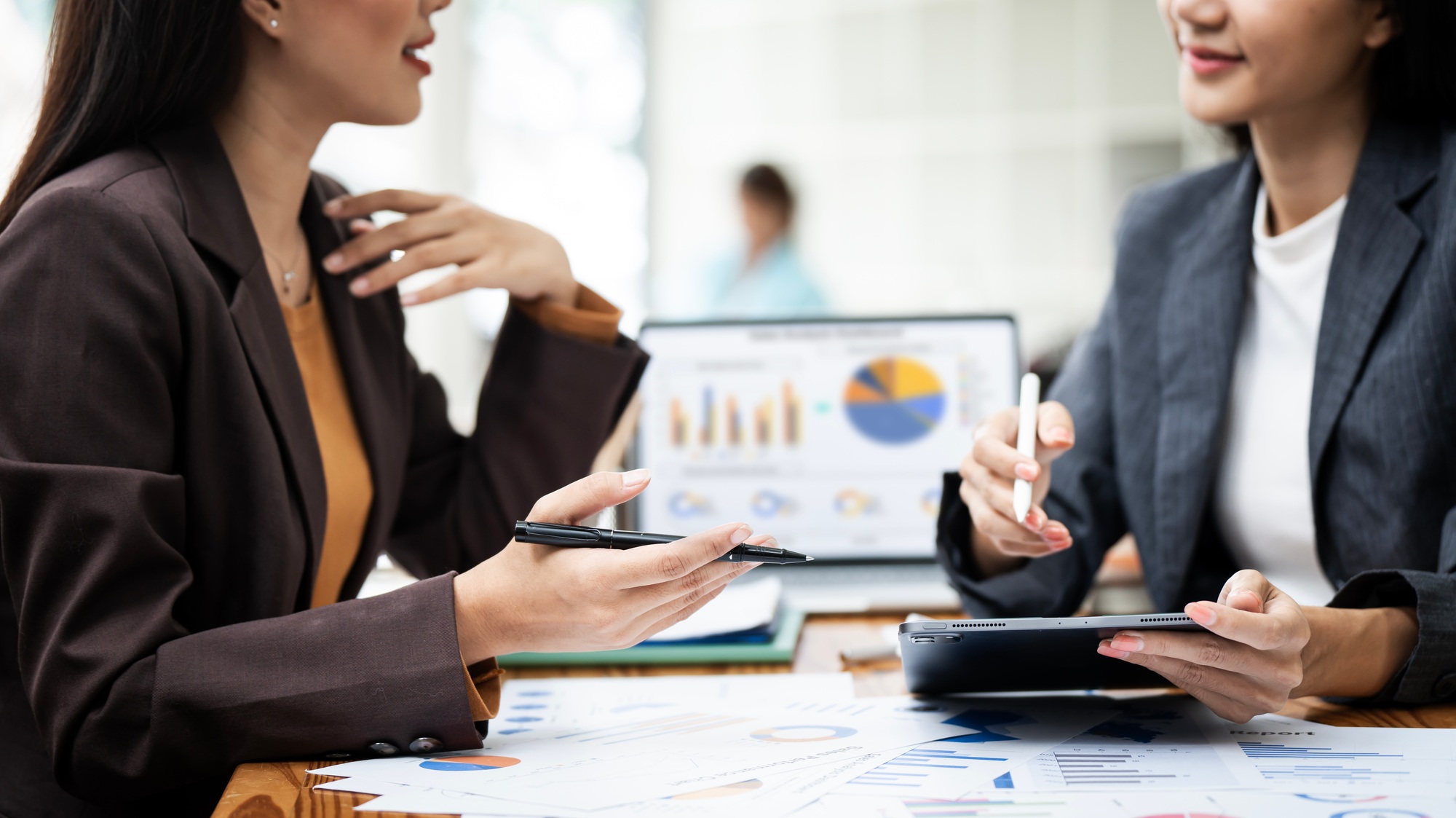 Business asian women analyzing market data, financial graph report, economic growth,
