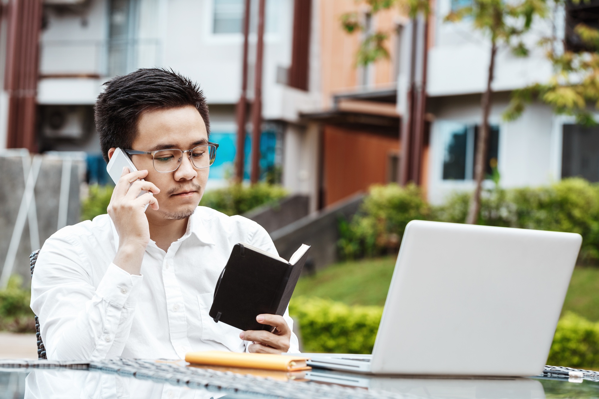 Business Concept - Young Business man woking on Financial plan. Strategy Analysis