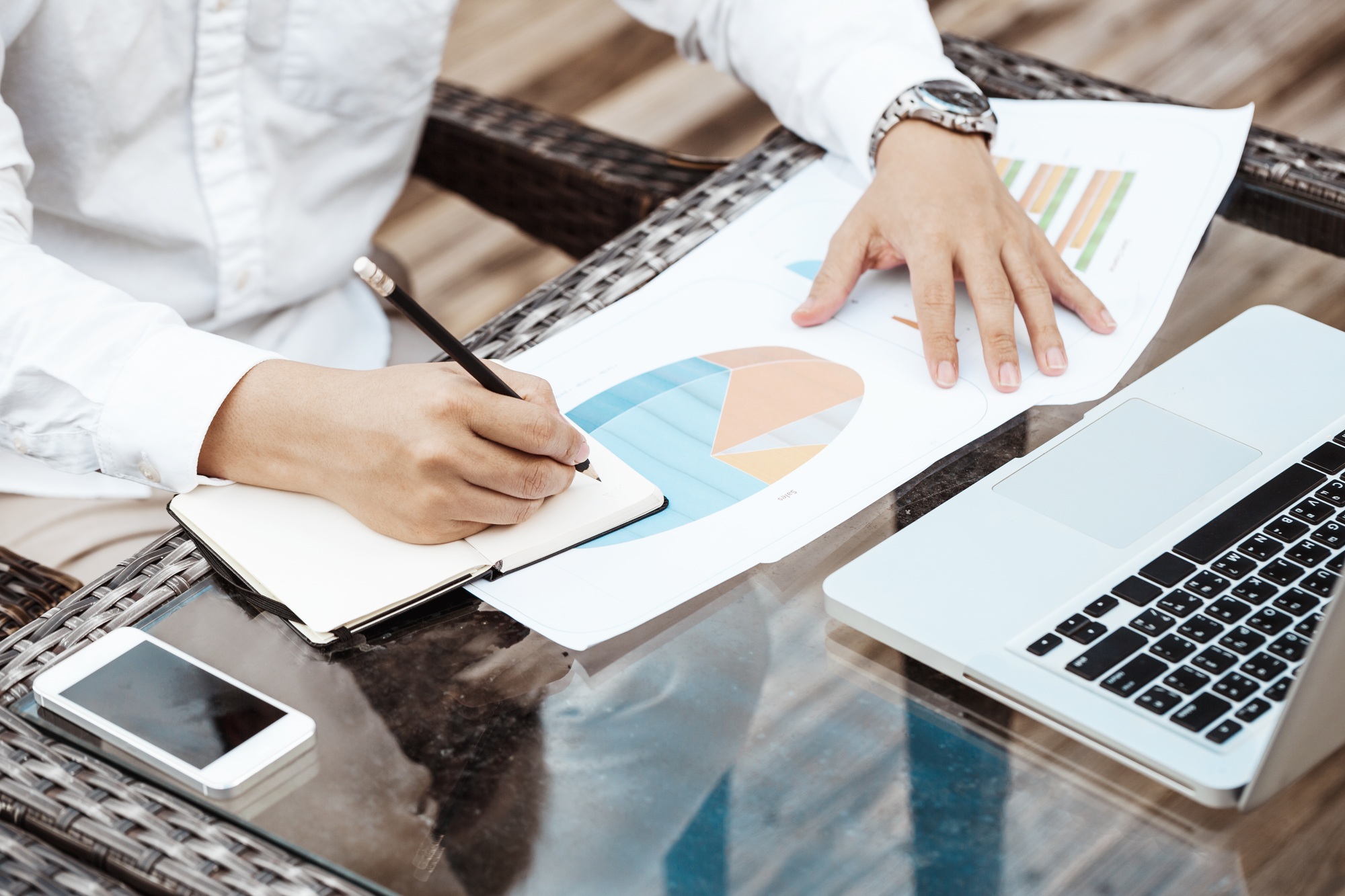 Business Concept - Young Business man woking on Financial plan