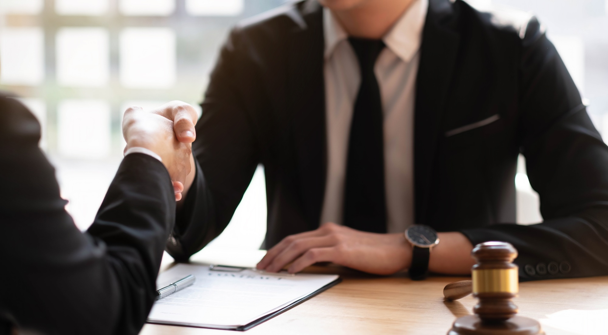Business lawyer and partnership consult and meeting concept. Image businessmans handshake