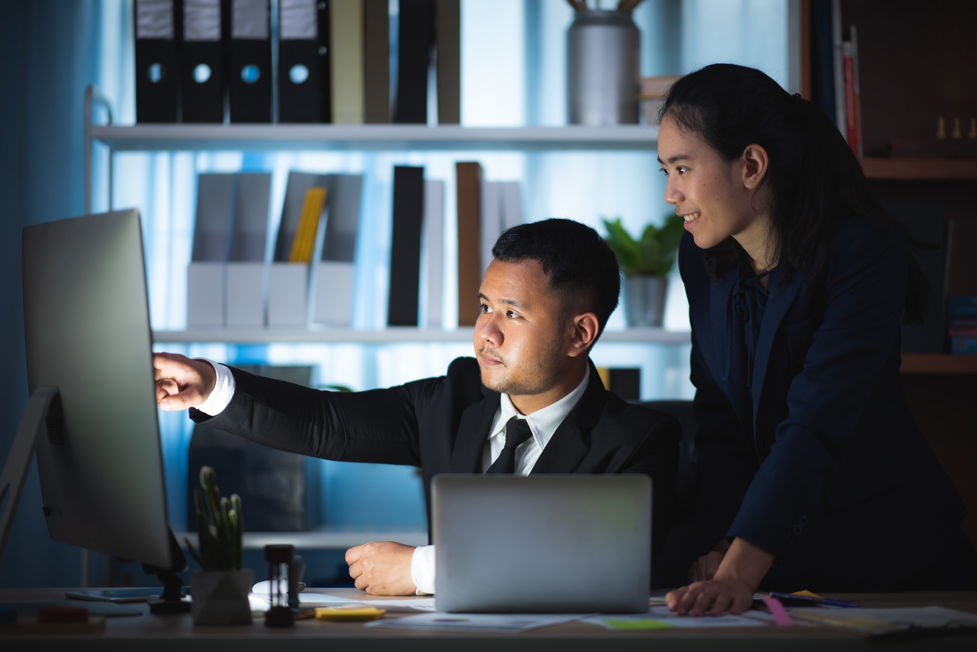 Business men are planning their business plans for a growing company.