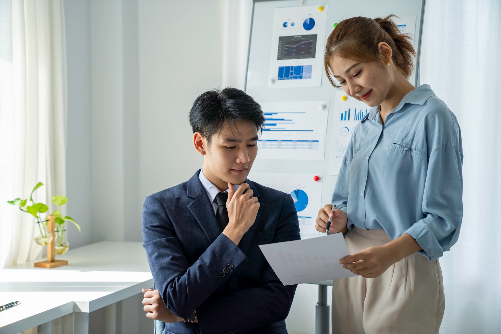 Business people discuss investment projects working and planning strategy and strategic analysis and