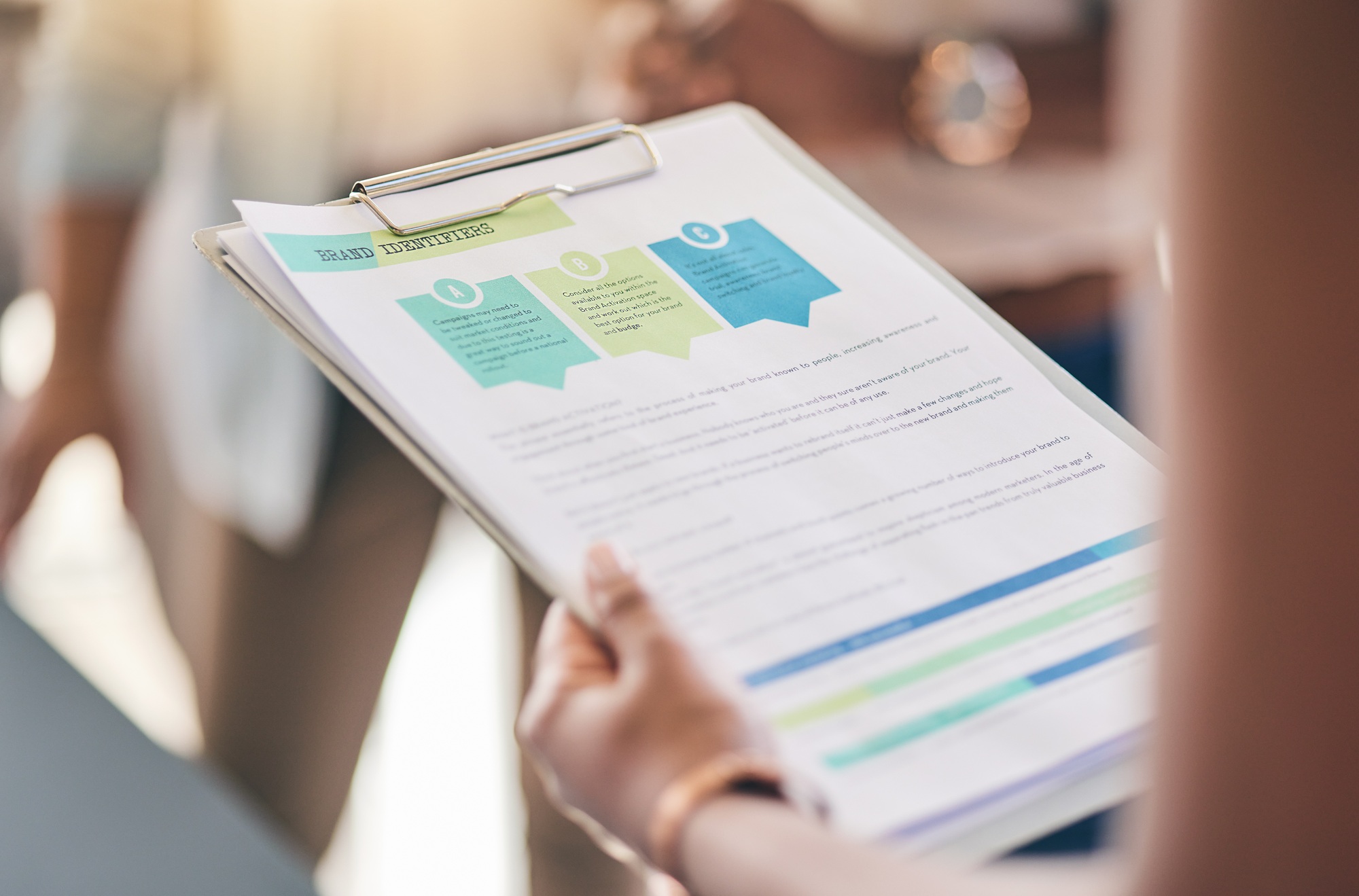 Business people, hands and documents for brand identity, marketing infographics and information for